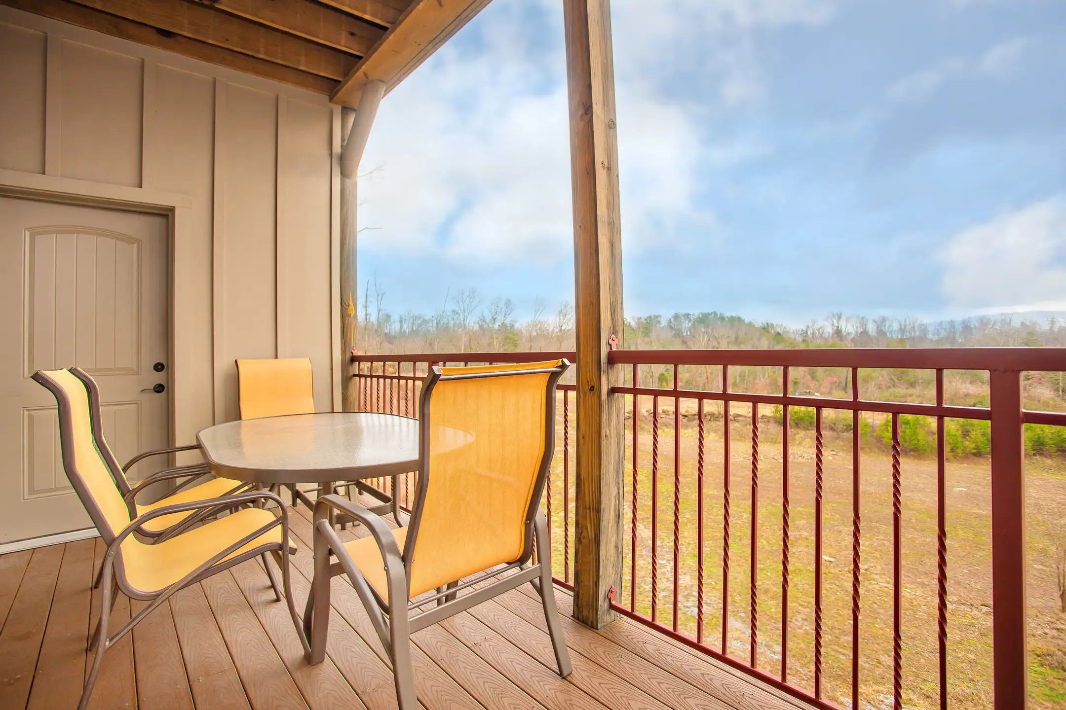 image Unwind on the spacious deck, complete with comfortable seating that invites you to relax and take in the peaceful outdoor surroundings.