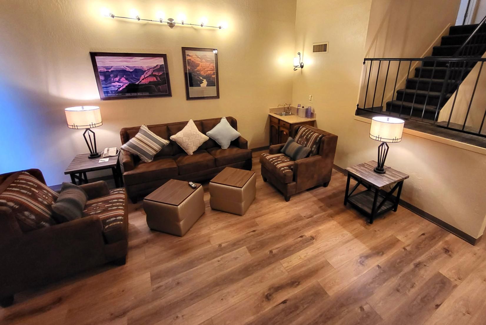 image Cozy Living Room – This inviting living room features comfortable seating, stylish decor, and warm lighting.