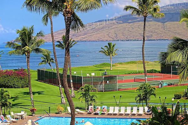 image Take advantage of the resort's tennis courts with stunning ocean vistas, perfectly complementing the beachfront access just steps away.