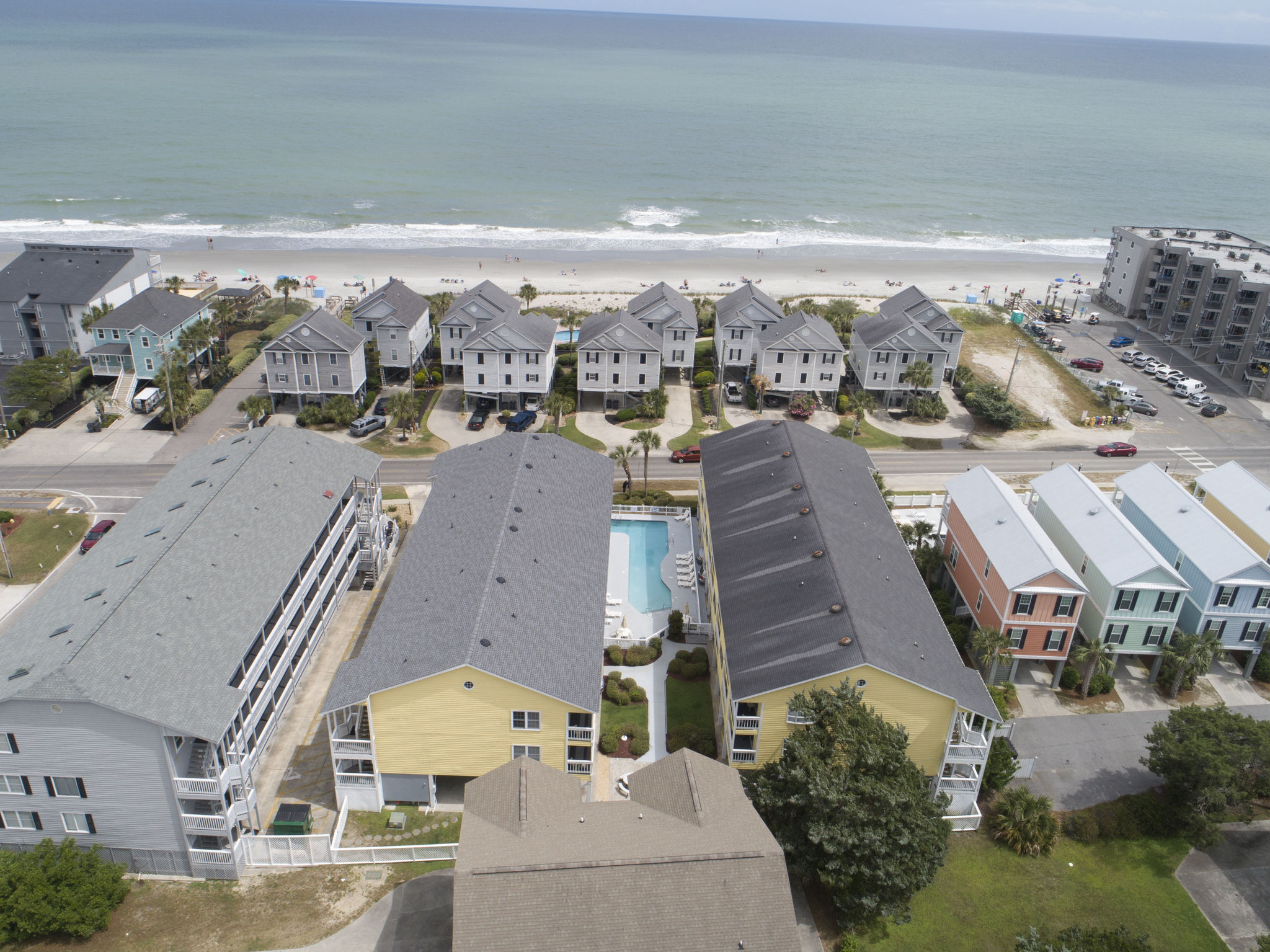 image Enjoy breathtaking ocean views from this spacious 3-bedroom condo at Sandy Shores III, just steps from the beach.