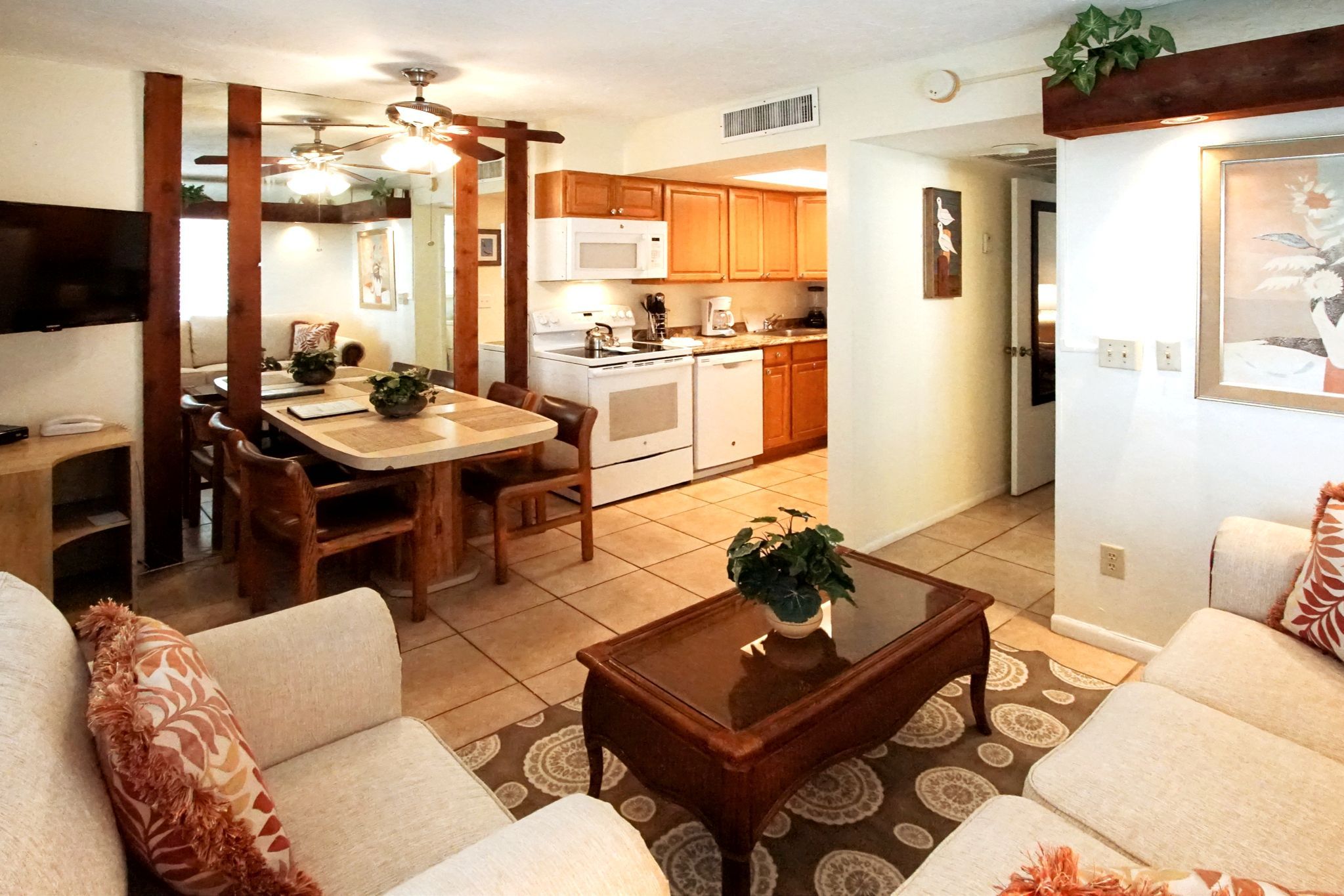 image Unwind in the inviting living space, complete with a fully-equipped kitchen and Smart TV for your perfect getaway.