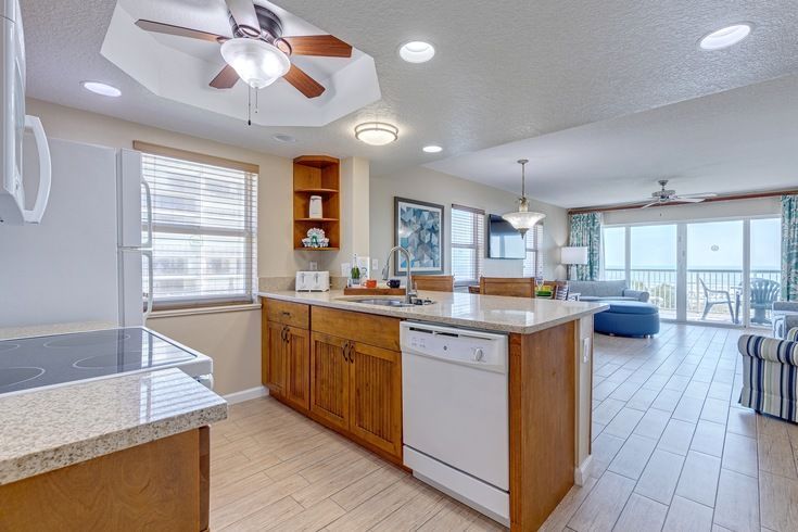 image This full kitchen invites you to prepare meals while basking in the natural light and ocean breeze.