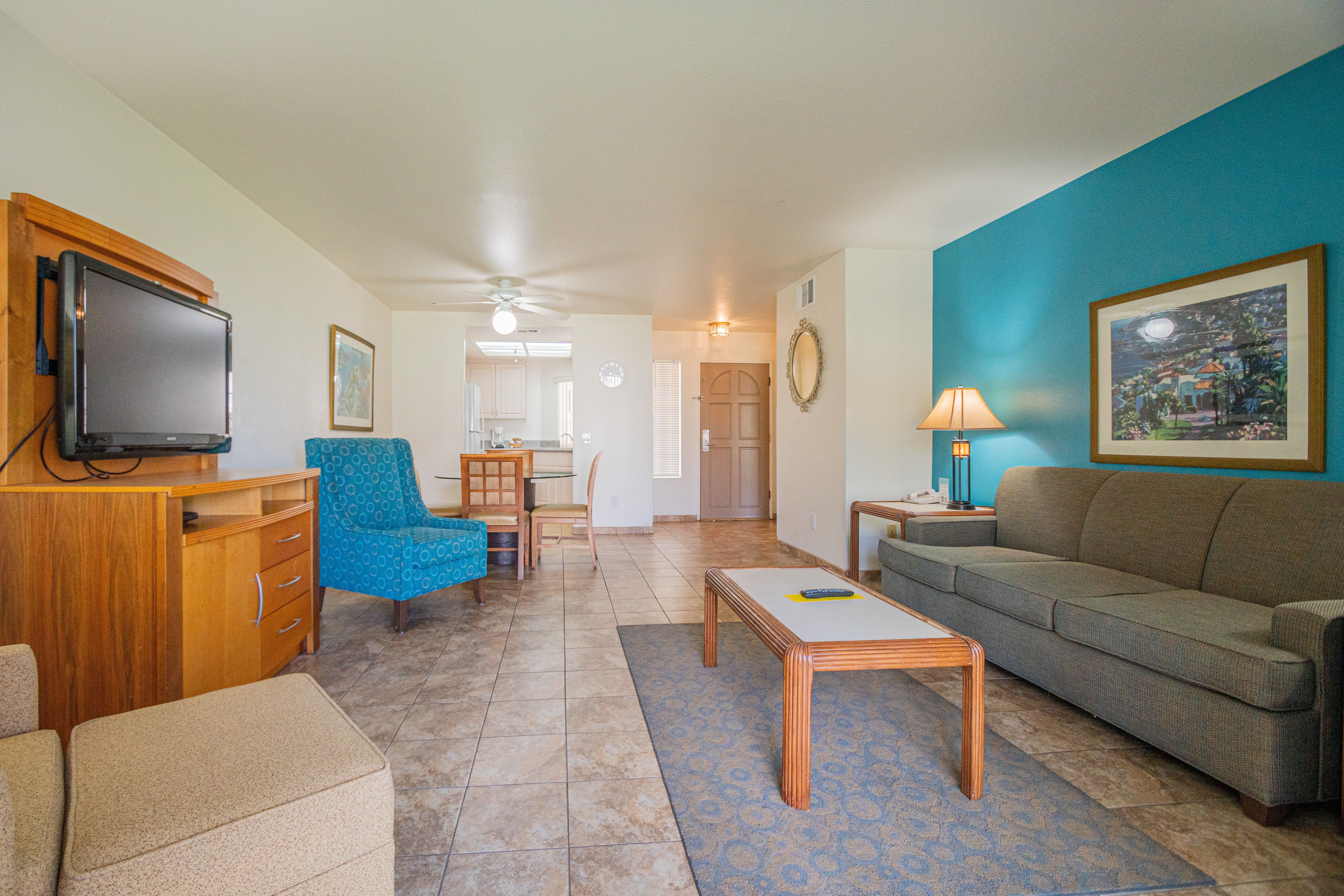 image Step inside this family-friendly retreat featuring a cozy living area with a king bed and a convenient sofa bed for a comfortable stay.