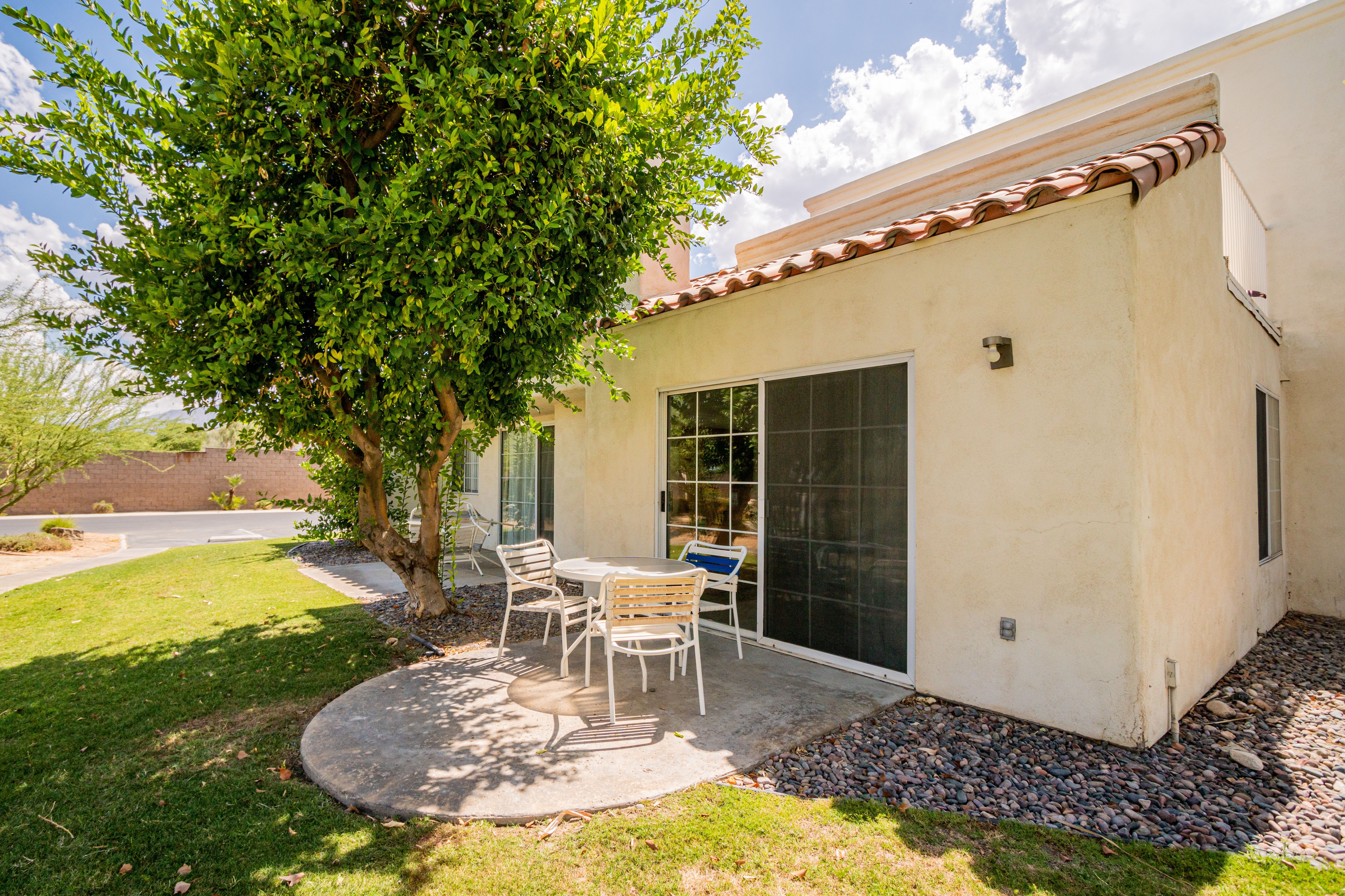 image Relax on your private patio, ideal for enjoying meals outdoors in the stunning desert landscape just a stone's throw from El Paseo and the Living Desert Zoo.