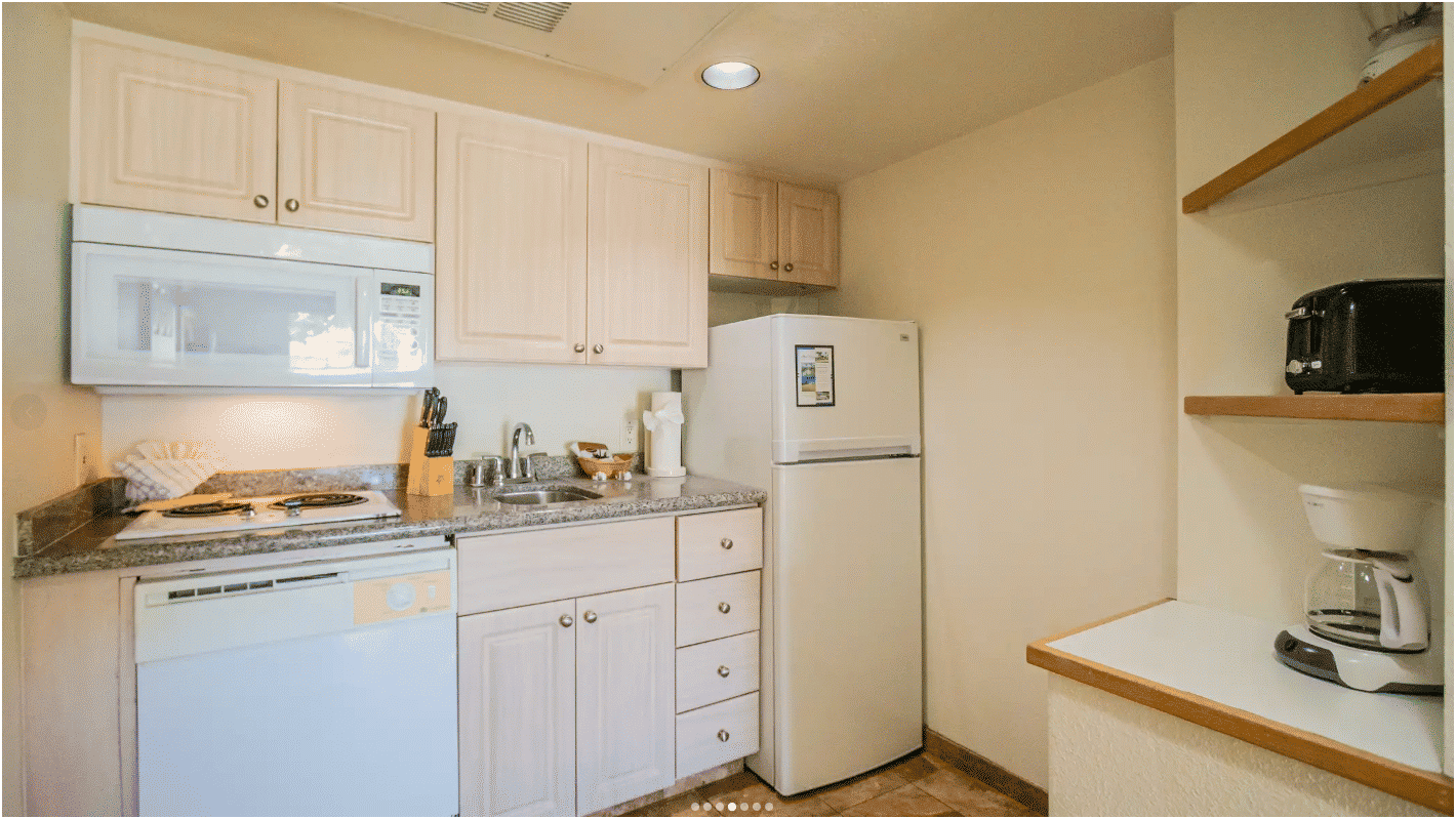 image Step into a fully equipped kitchenette, designed for seamless meal preparation, allowing you to enjoy the comforts of home during your stay.