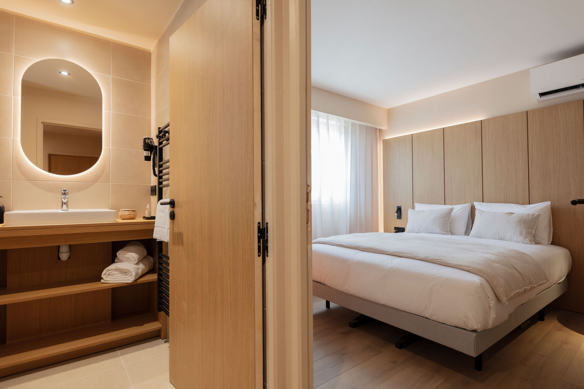 image Comfortable queen bedroom with soft lighting, warm tones, and elegant natural finishes for a restful retreat.