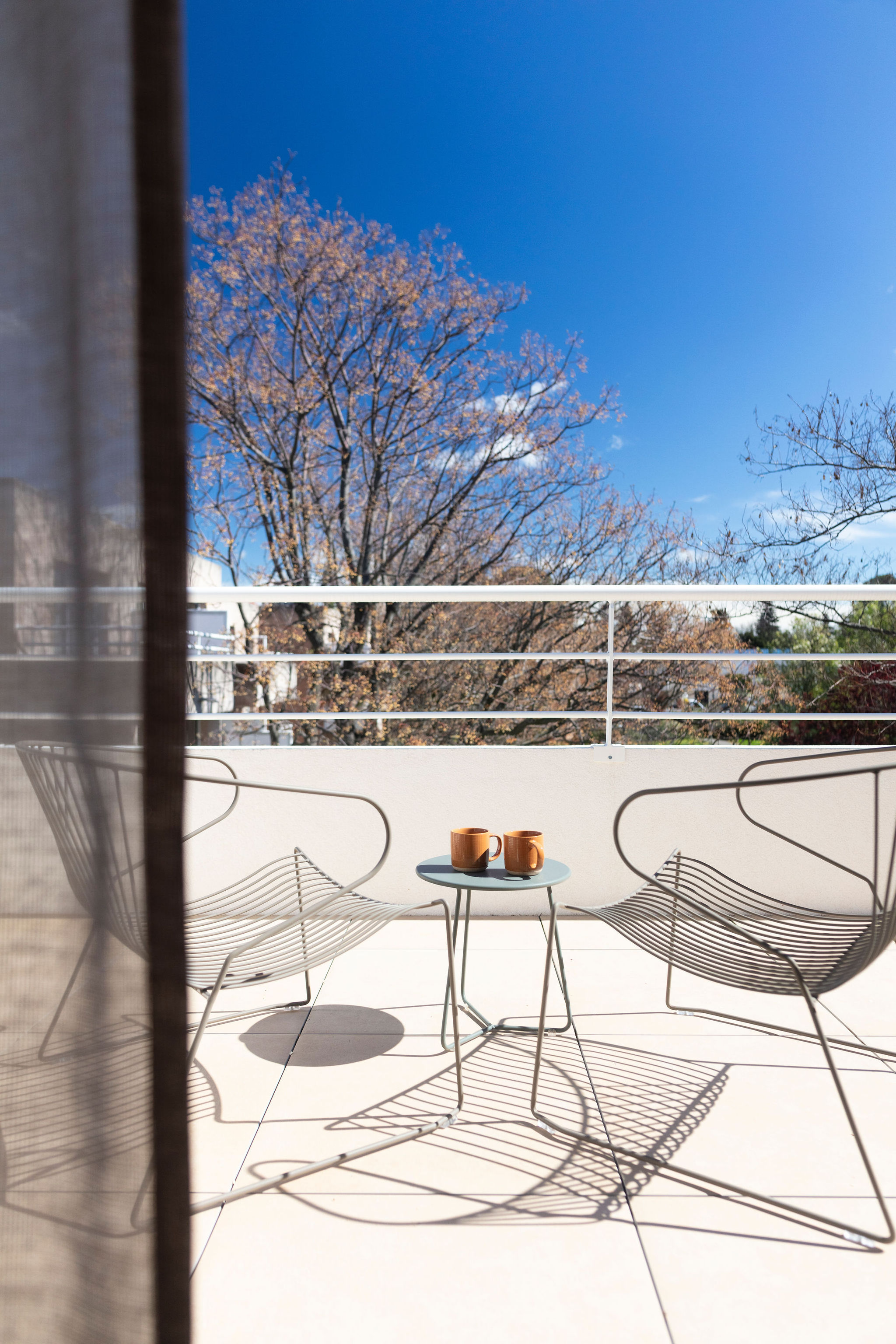 image Private terrace with outdoor seating, ideal for shared meals, morning coffees, or quiet evening moments.