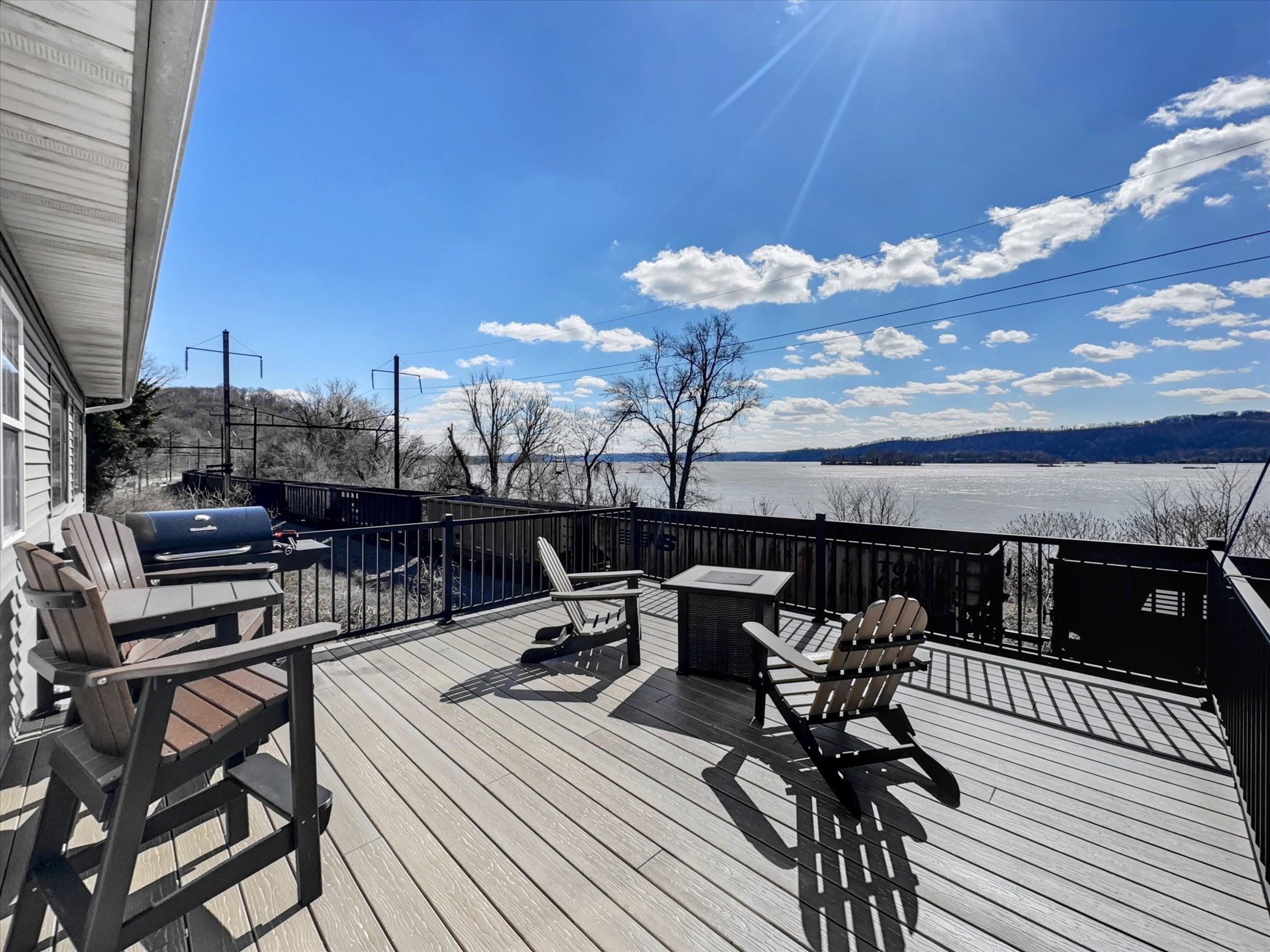 image Expansive views of the Susquehanna and passing trains from the private deck seating area.