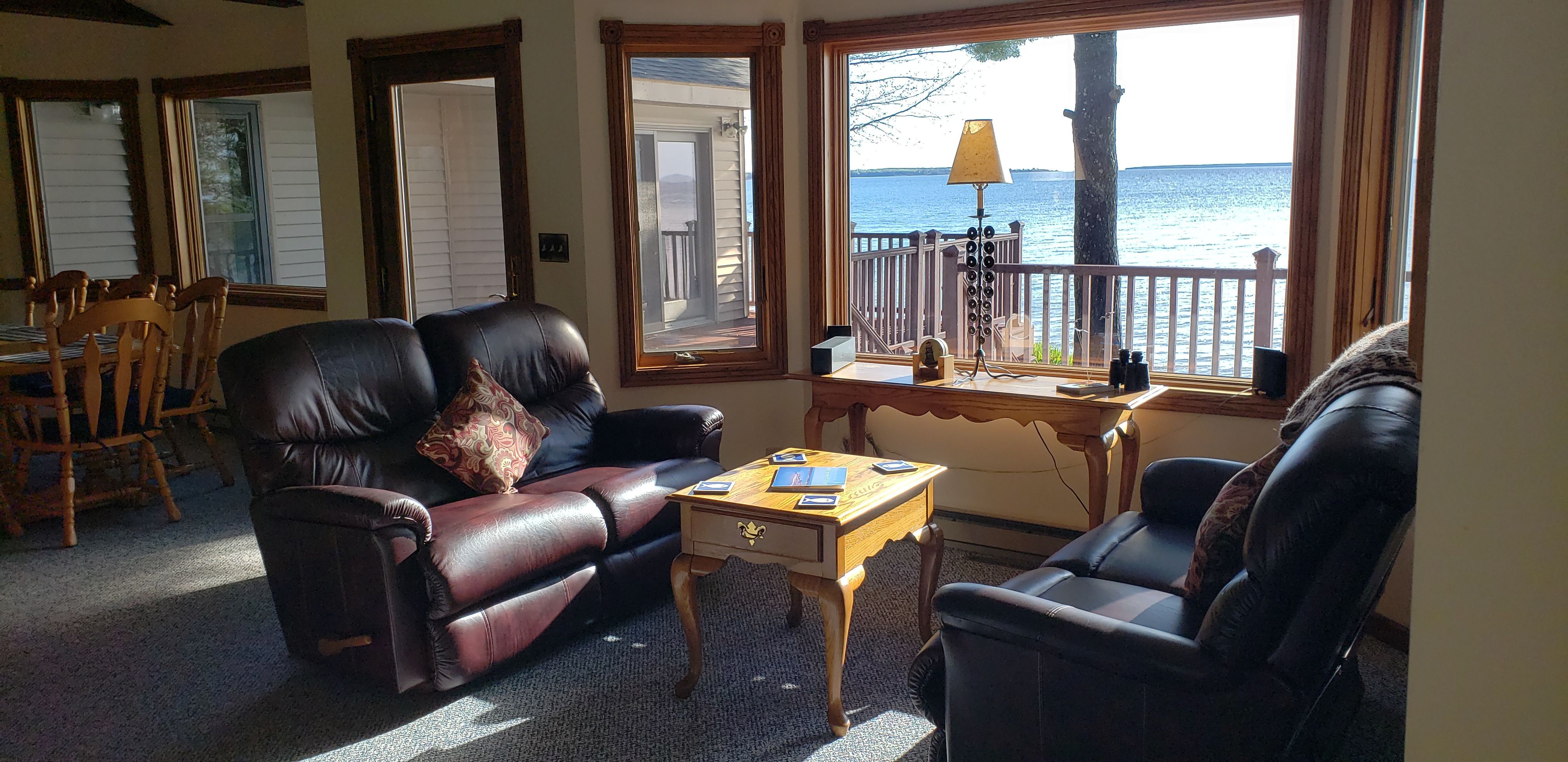 image Comfort meets charm in this inviting lounge area, perfect for relaxing after beach days or cozying up by the fireplace.