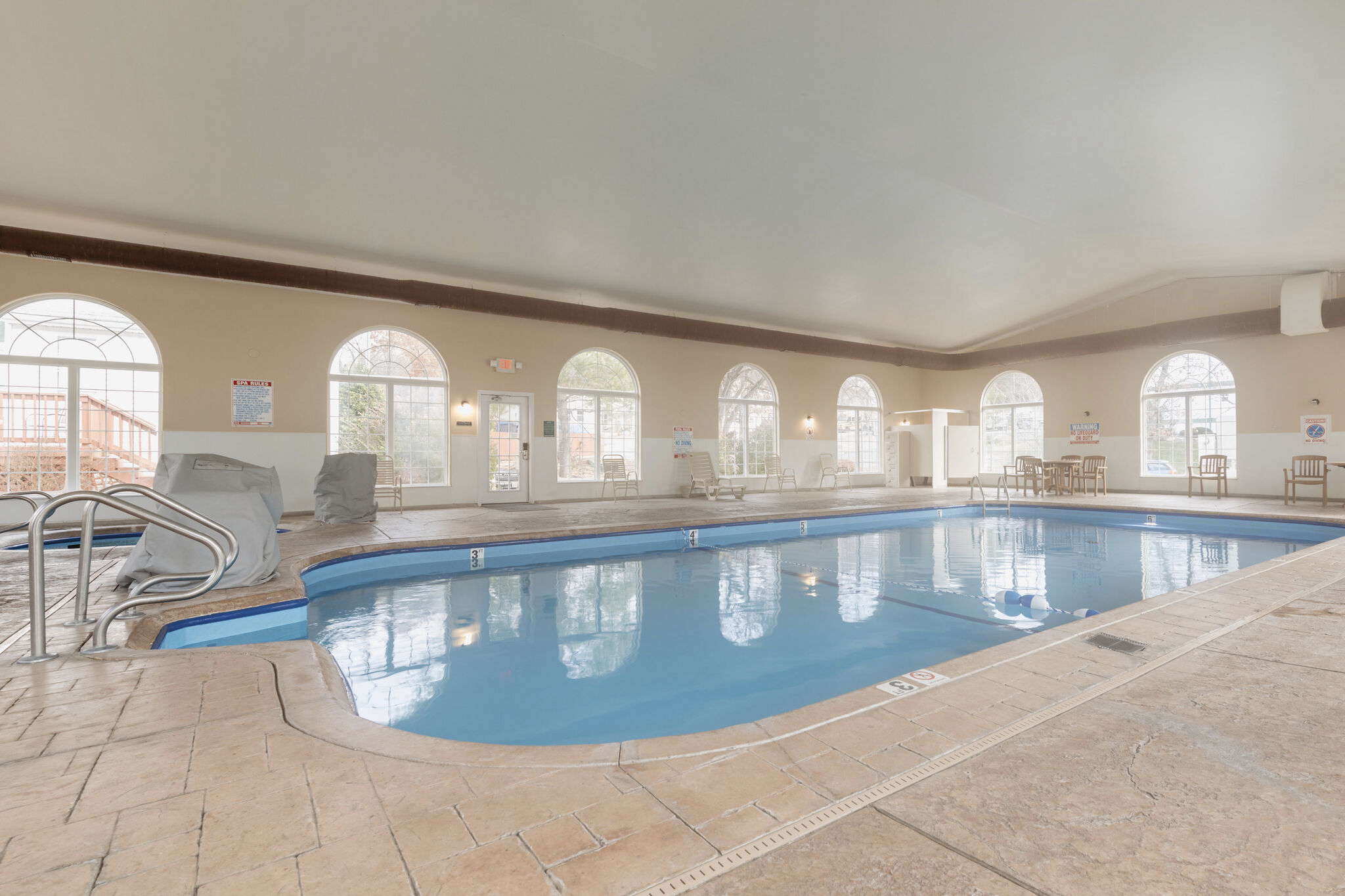 image Swim indoors year-round in a spacious pool.