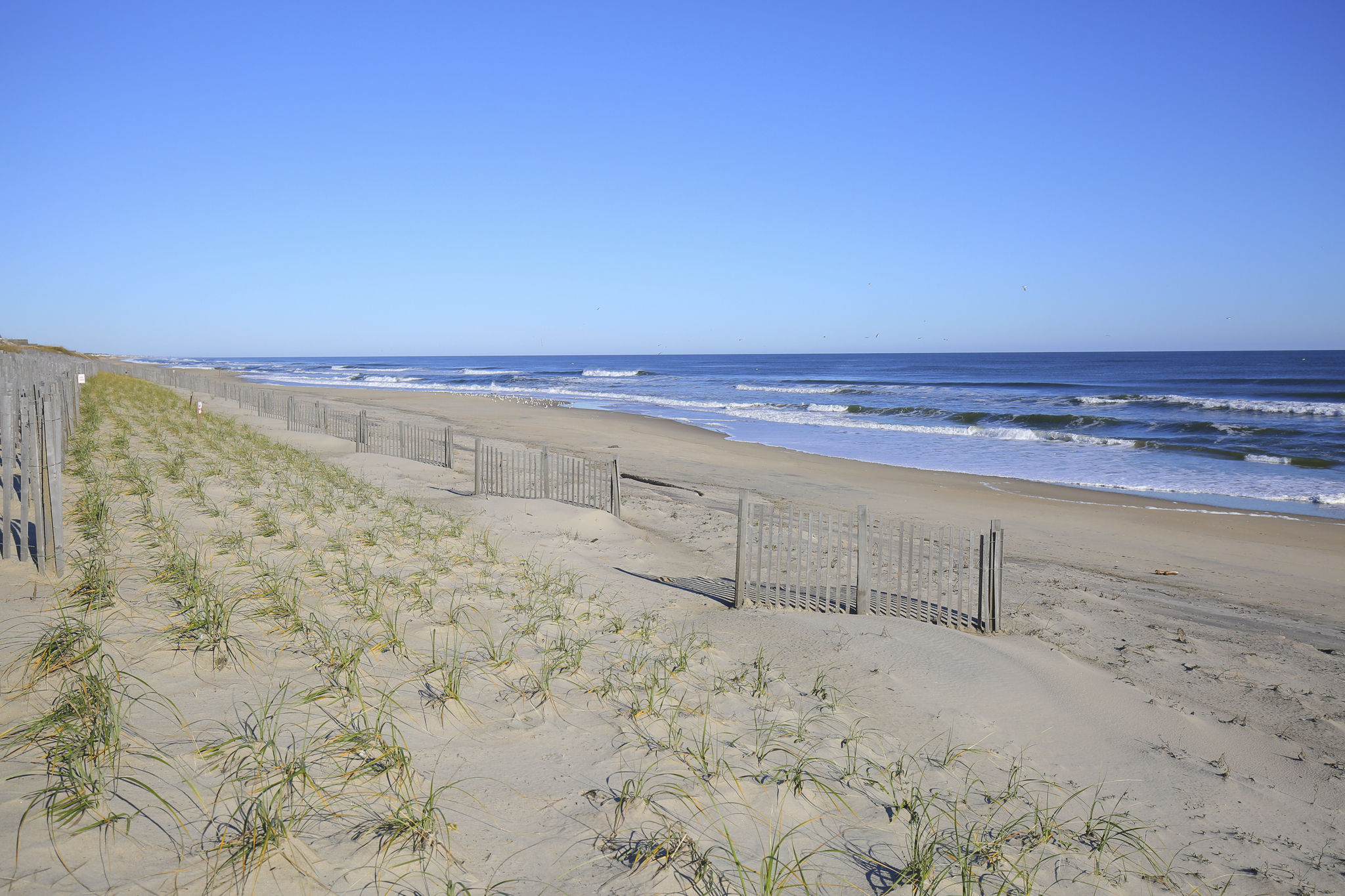 image Enjoy serene ocean views just steps away from your private balcony at Ocean Pines Resort in Duck, NC.