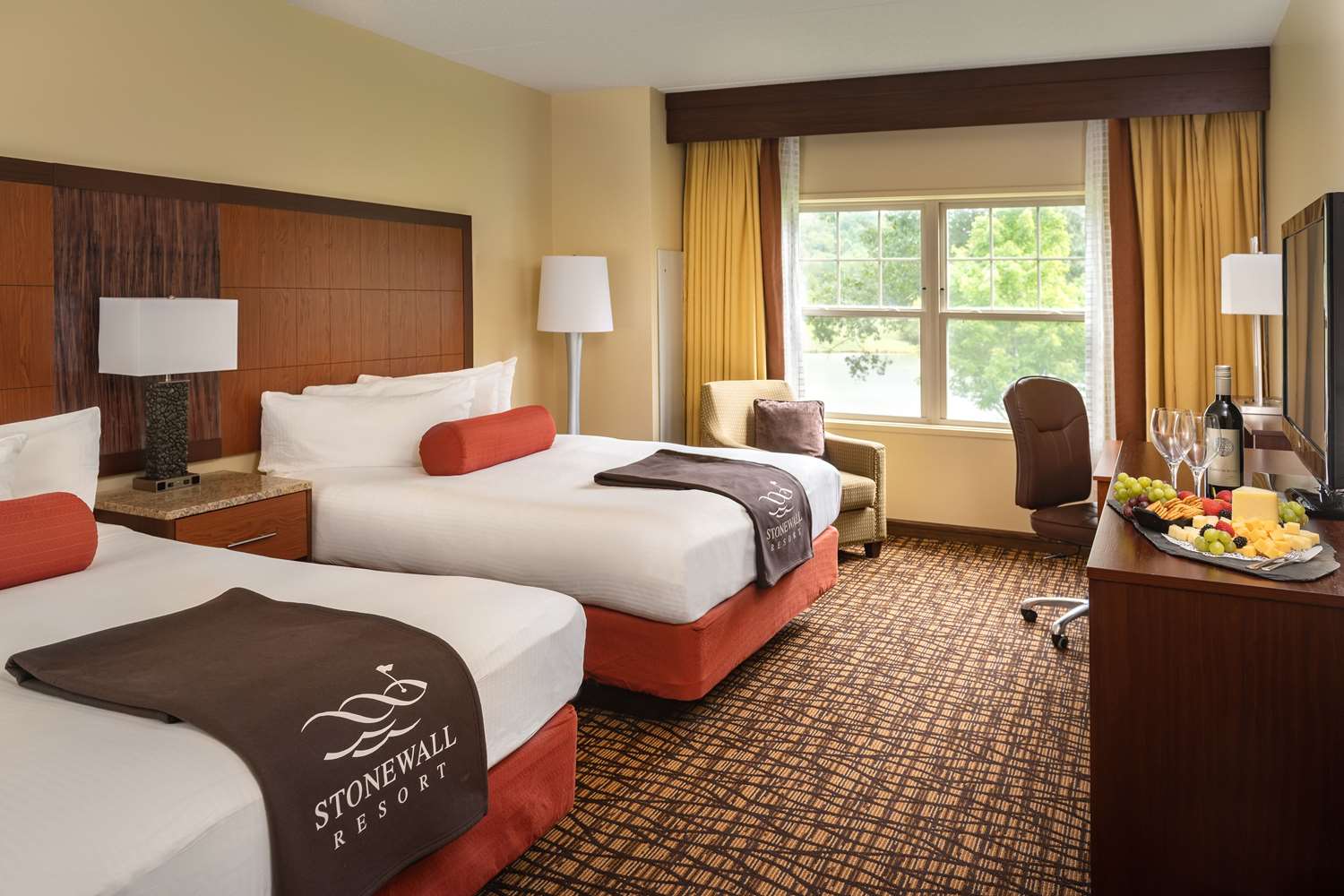 image Rustic elegance and calming lodge tones pair with park views for a restful and welcoming stay.