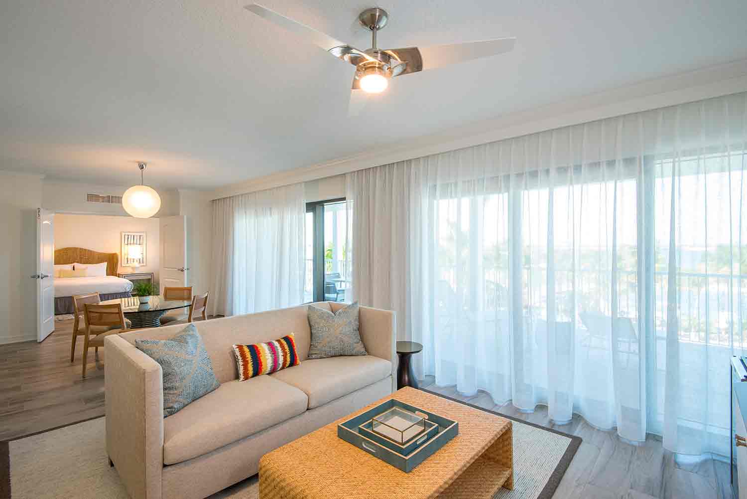 image Gather for easygoing moments in a sunlit lounge where island breezes and open skies meet indoors.