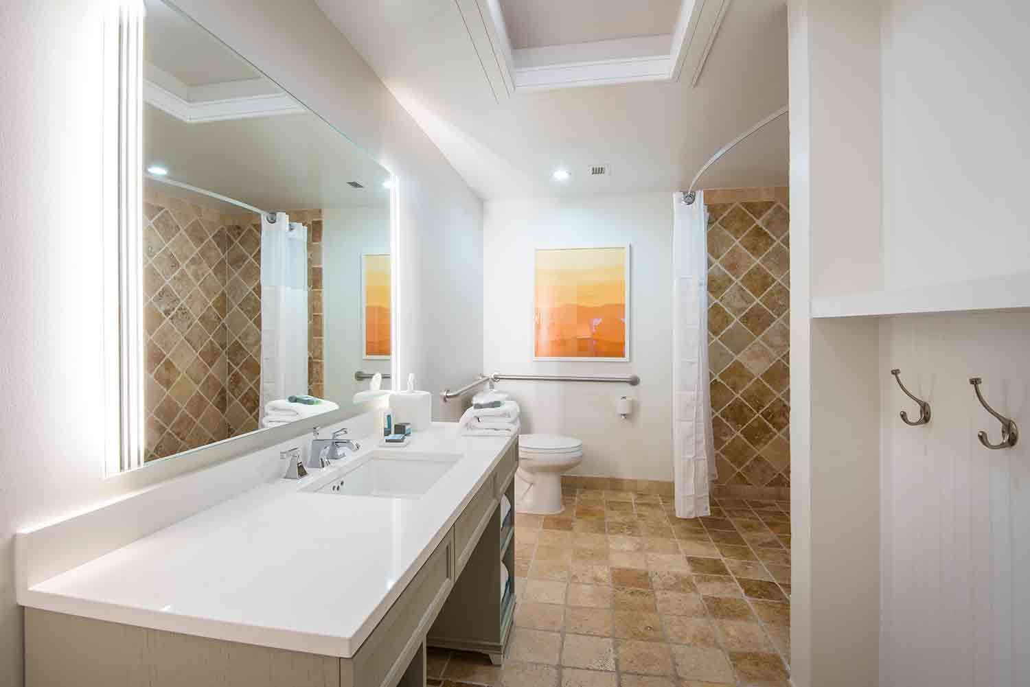 image Start each day refreshed in a bright, calming space where smooth surfaces and warm tones inspire easygoing routines.