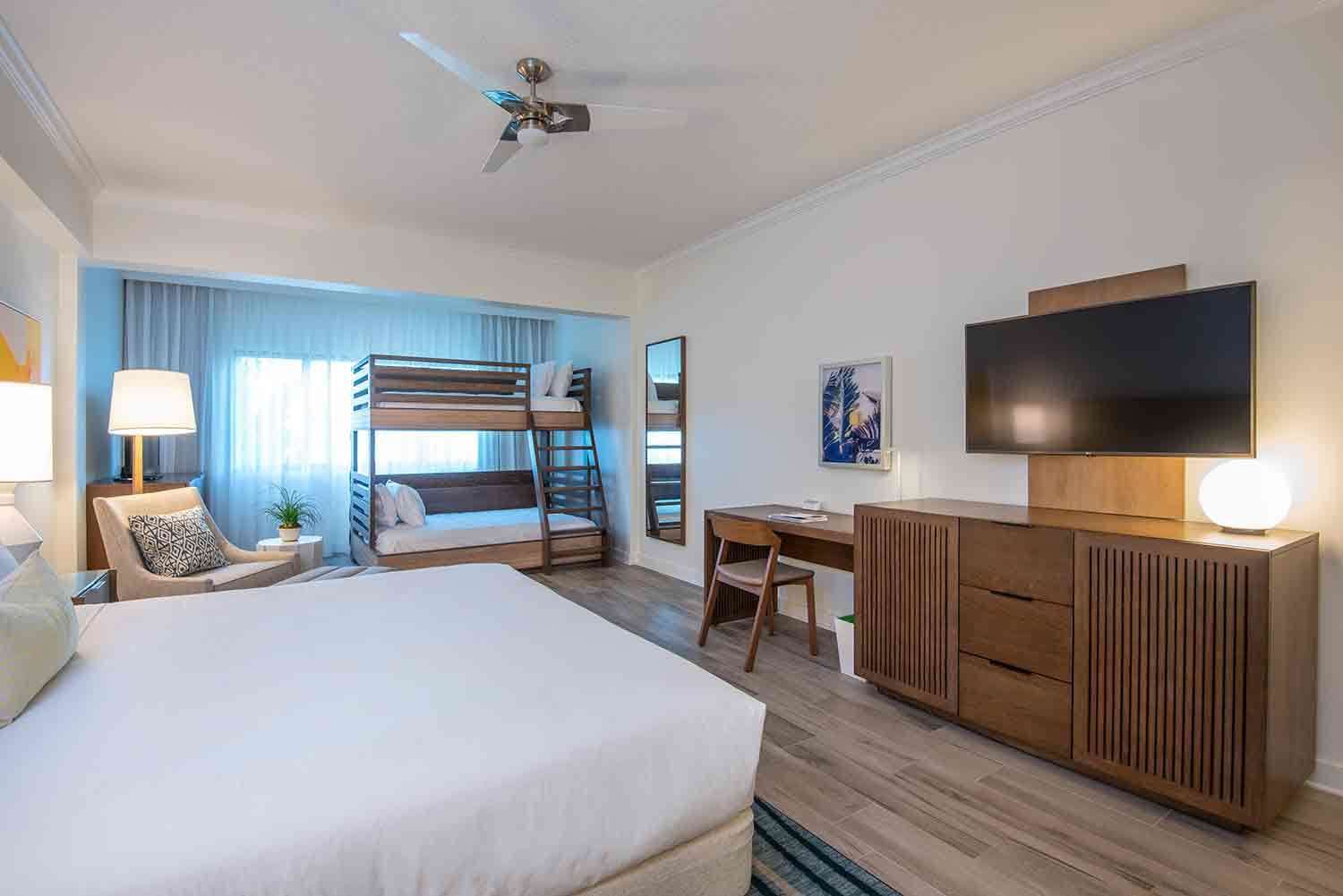 image Share easy mornings and restful nights in a room that balances laid-back elegance with space for everyone.