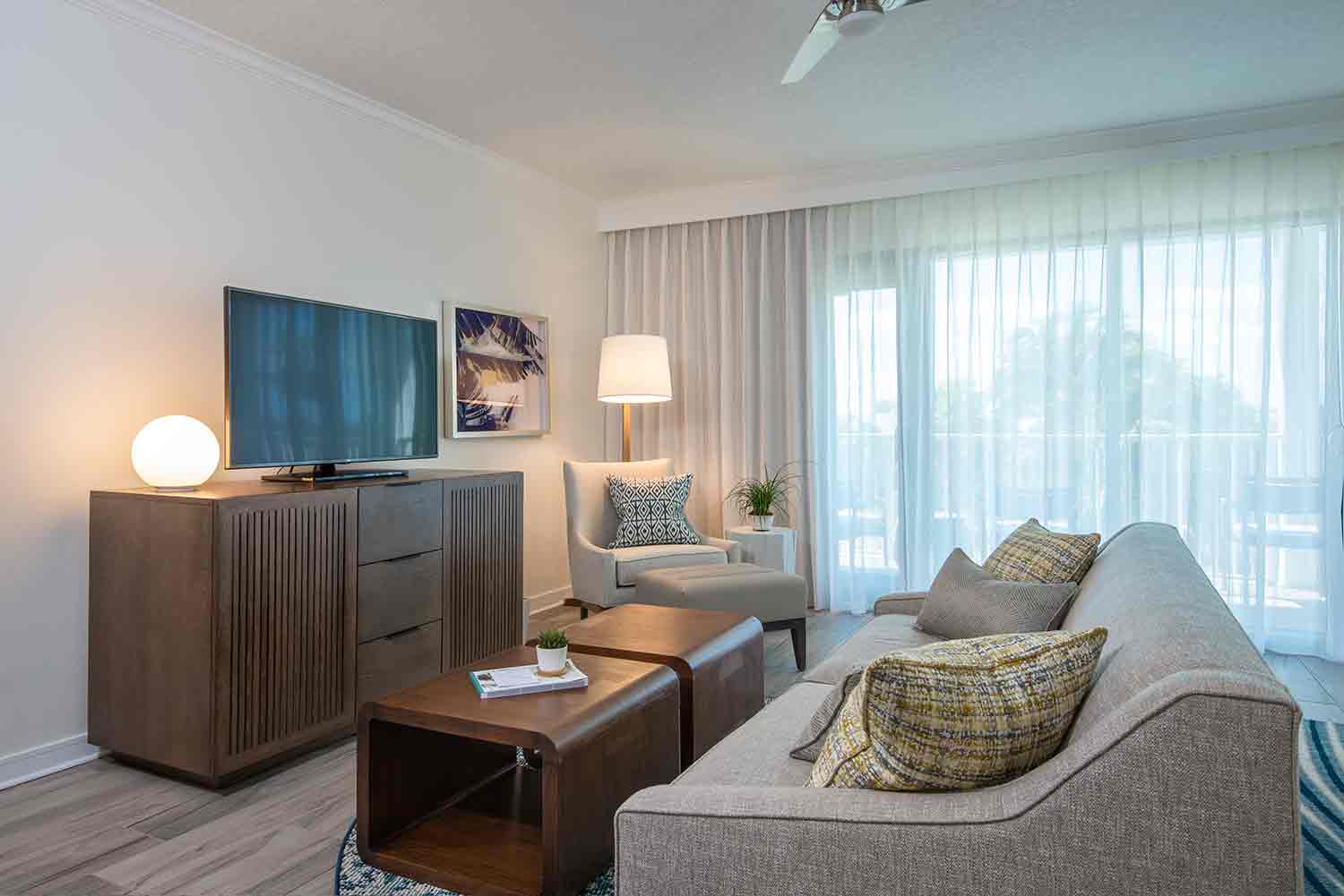image Kick back in a sunlit lounge where relaxed seating and natural textures invite cozy conversations and quiet moments.