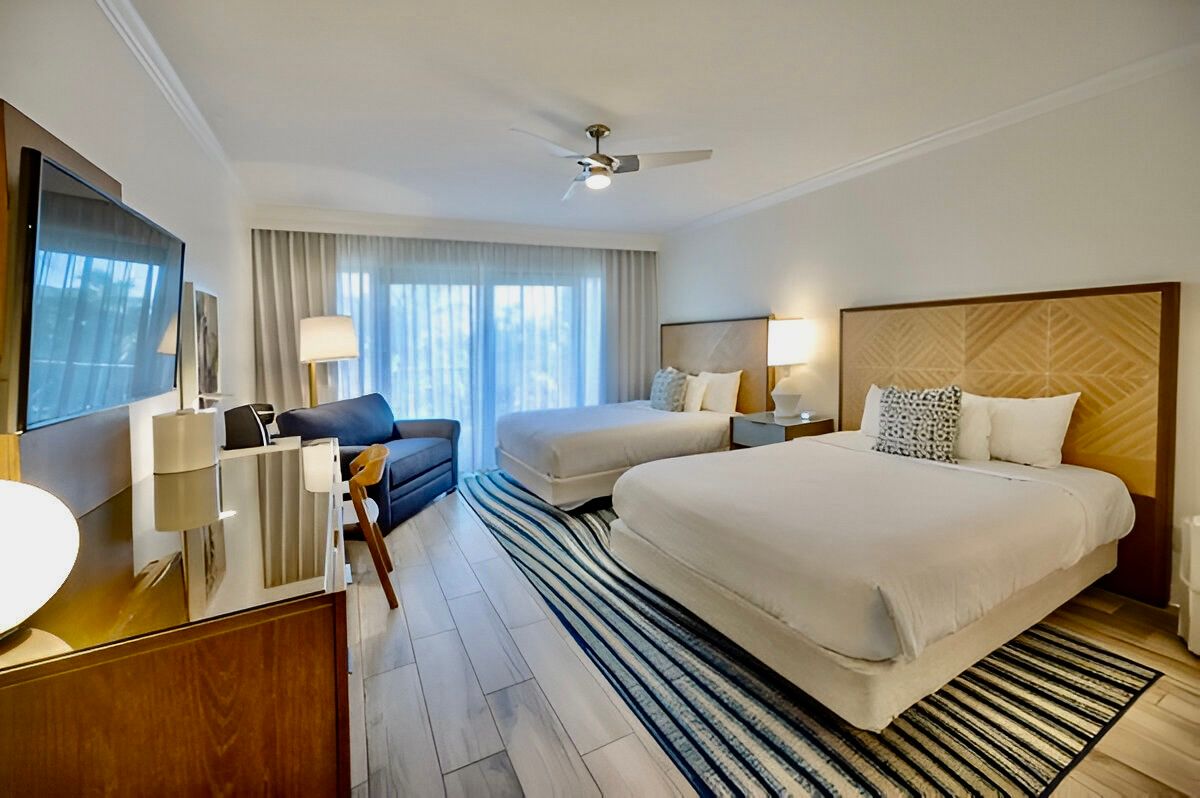 image Designed for comfort and connection, this airy space brings everyone together in effortless coastal style.