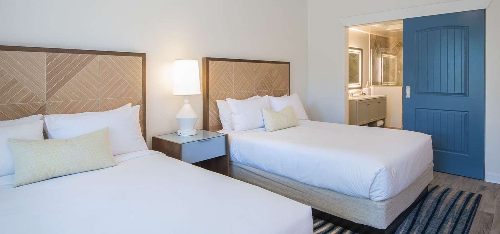 image Relax and recharge in a peaceful room where soft tones, open layout, and island ease come standard.