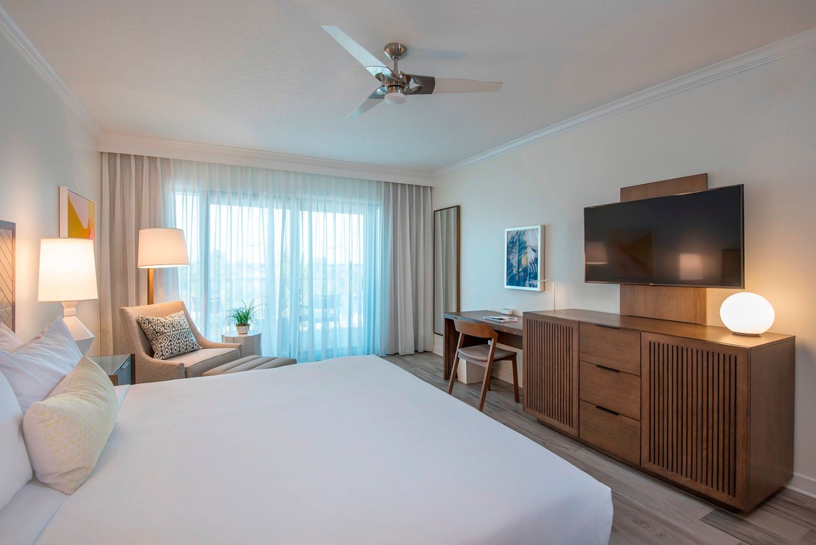 image Settle into a peaceful space where gentle light, natural textures, and thoughtful details create the perfect island escape.