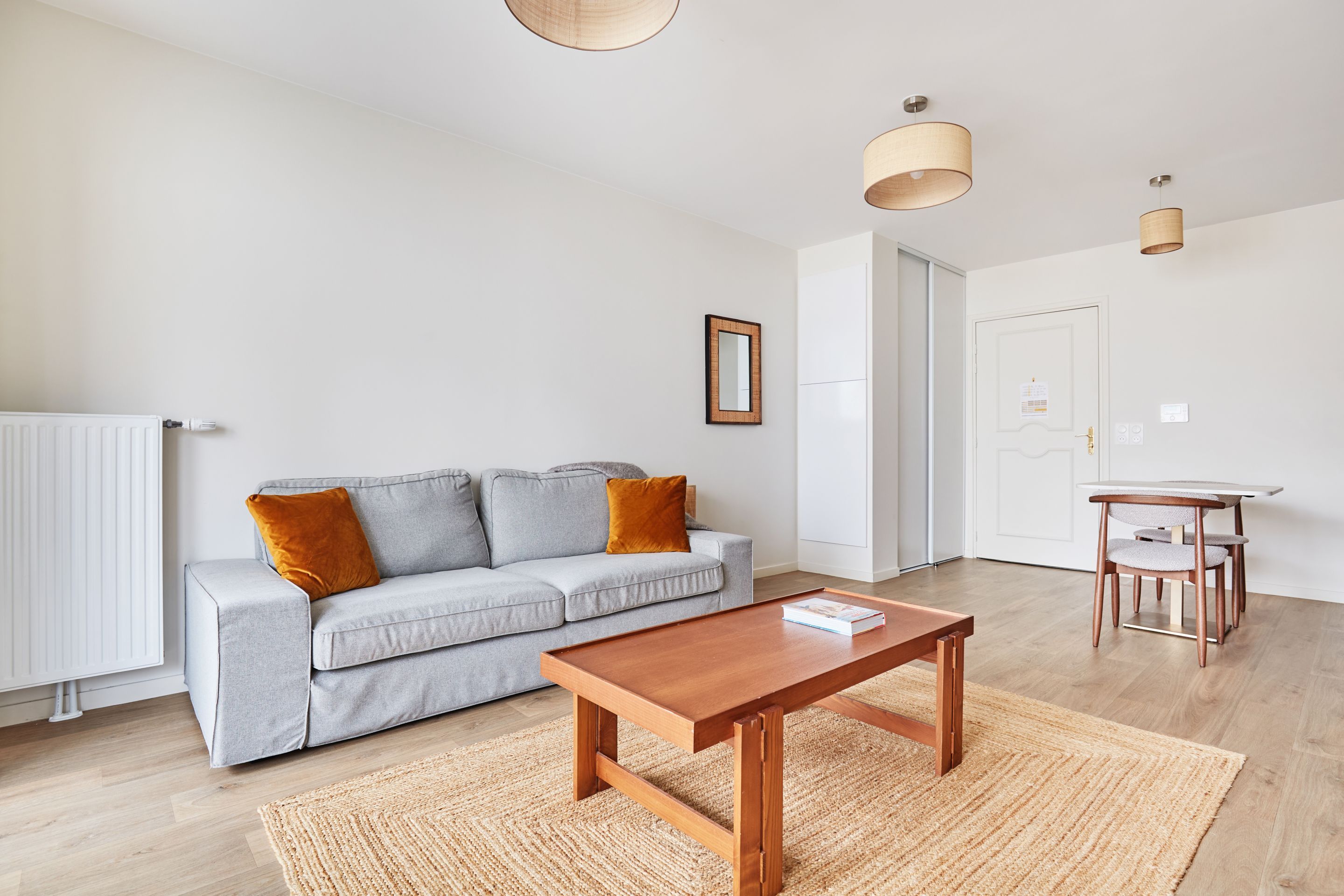 image Cozy lounge with optional sofa bed, ideal for families or small groups visiting the Paris area.