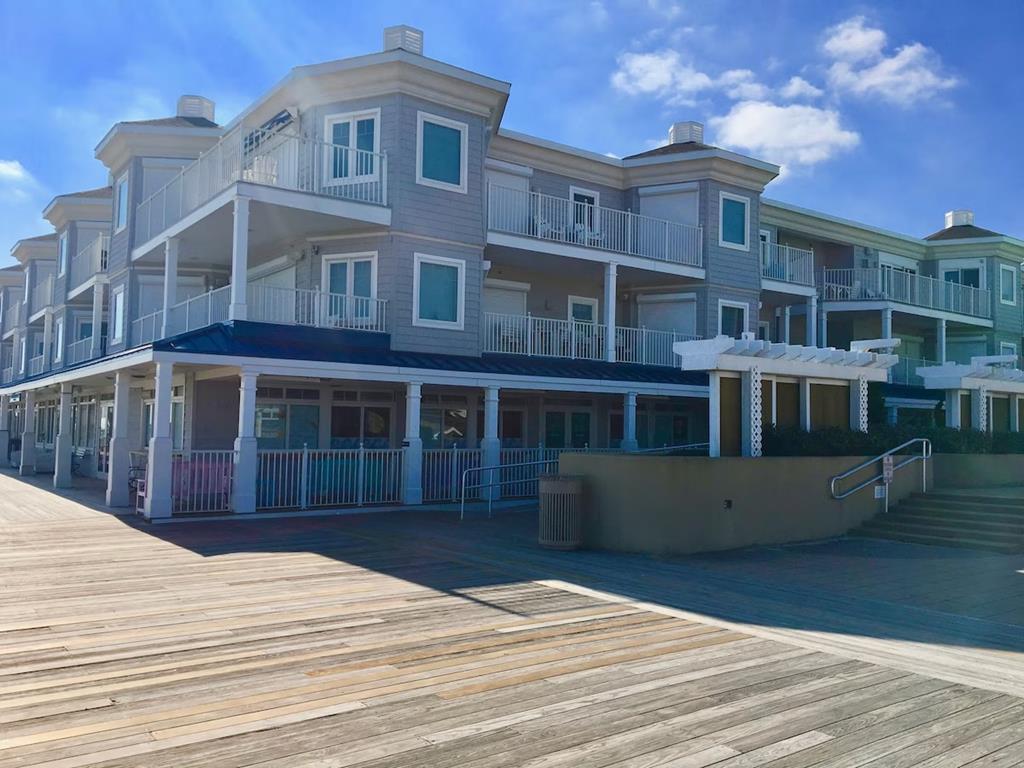 image This charming beach-area condo features three bedrooms and three baths, with a spacious layout and inviting porches perfect for enjoying coastal views.