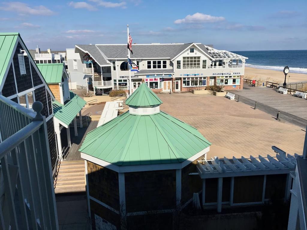 image Enjoy stunning ocean views and serene boardwalk access from this lovely beach-area condo, designed for relaxation and fun in the sun.