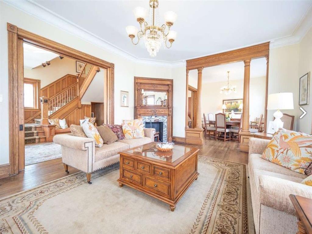 image An open layout connects the living area to the dining space, seamlessly blending comfort and style, making it perfect for entertaining family and friends.