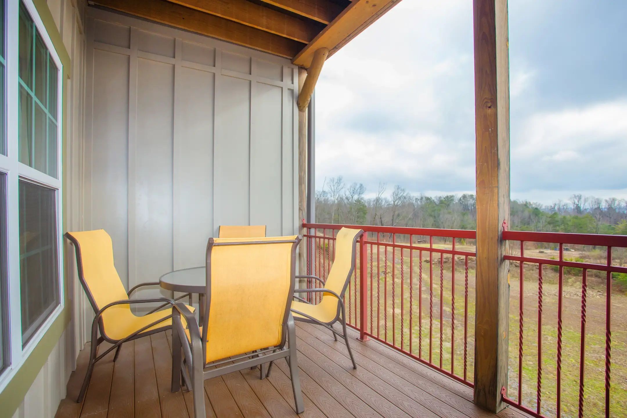 image Private balcony with outdoor seating and scenic views of the Smoky Mountains.