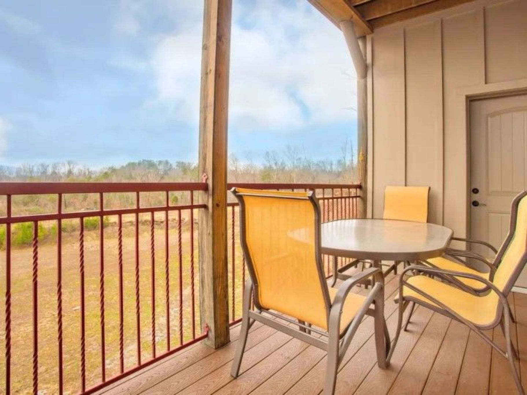 image Private balcony with seating and open view of the surrounding area.