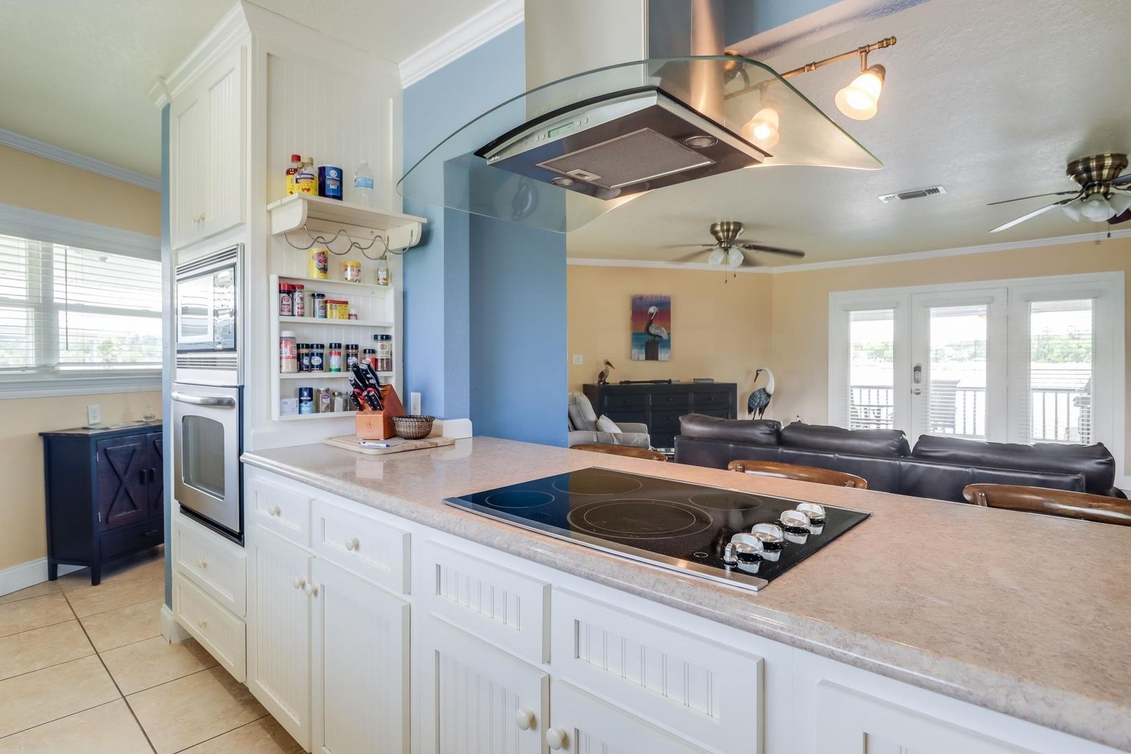 image The bright and airy open-concept kitchen seamlessly connects to the living area, perfect for gatherings and enjoying quality time.