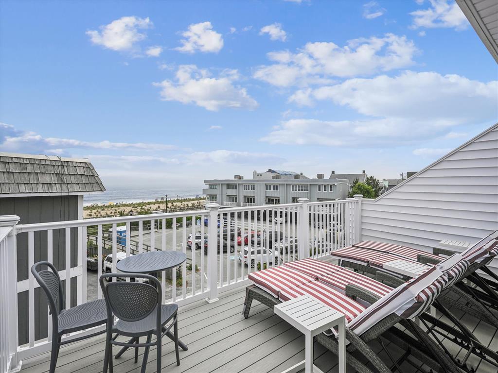 image Lounge under the sun or stars on the third-floor sundeck, offering privacy and panoramic views of Bethany Beach.