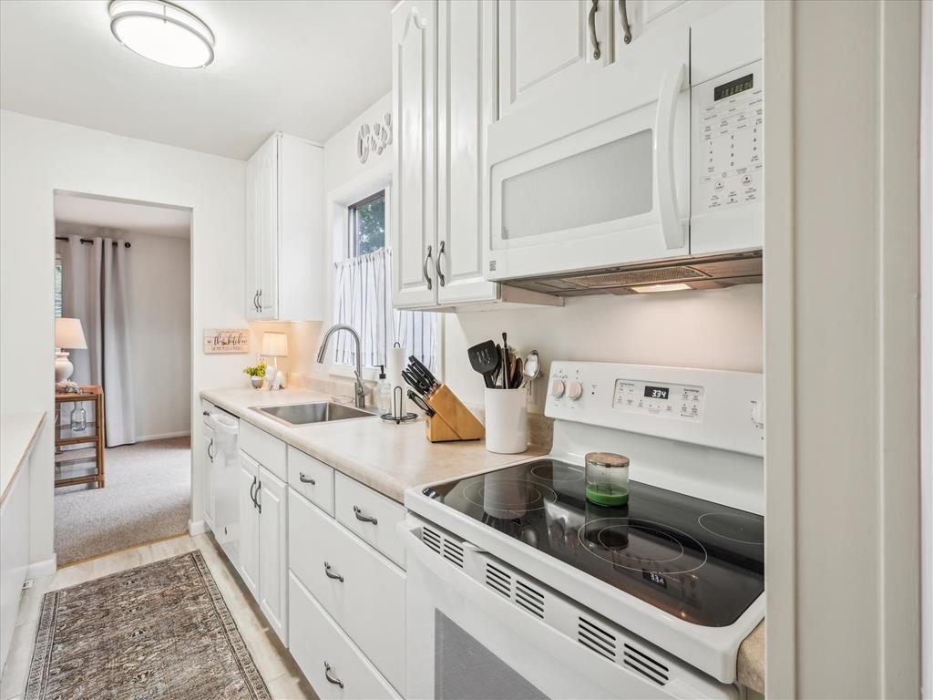 image Fully equipped kitchen with dishwasher, stove, and microwave—cook just like at home.