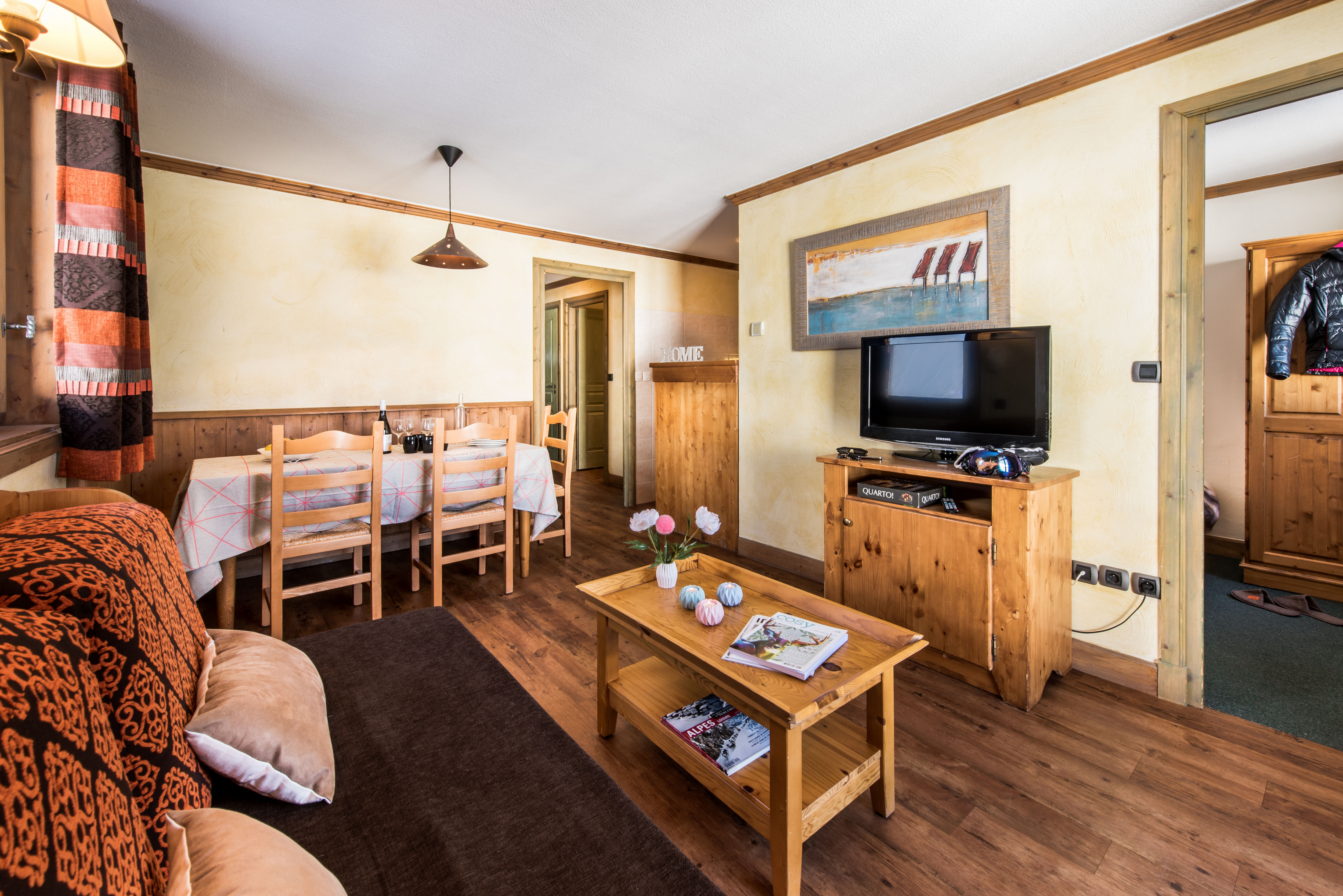 image Open-plan layout with cozy dining, lounge, and kitchen space — perfect for small families.