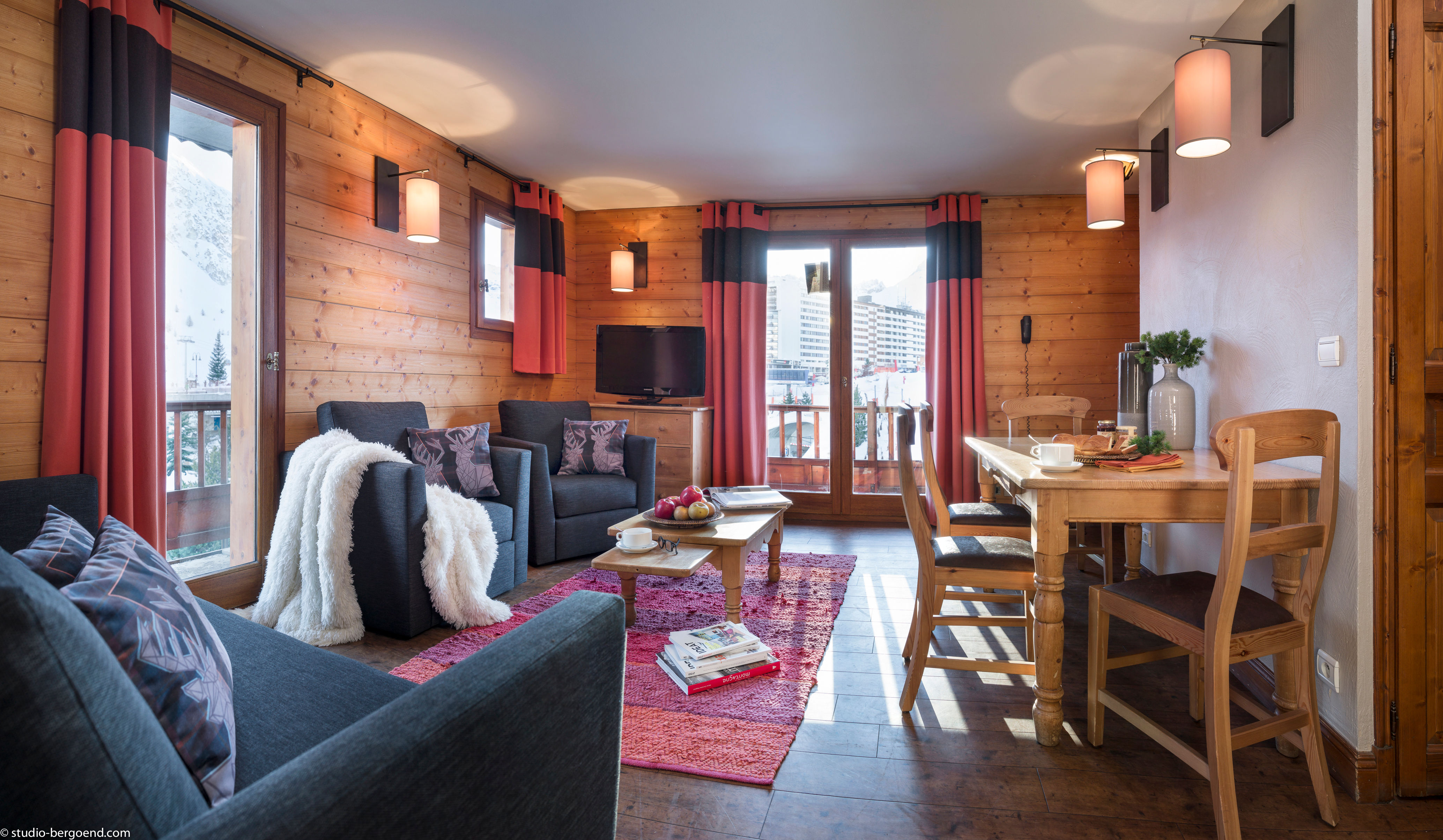 image Open-concept lounge and dining area with access to the private balcony.