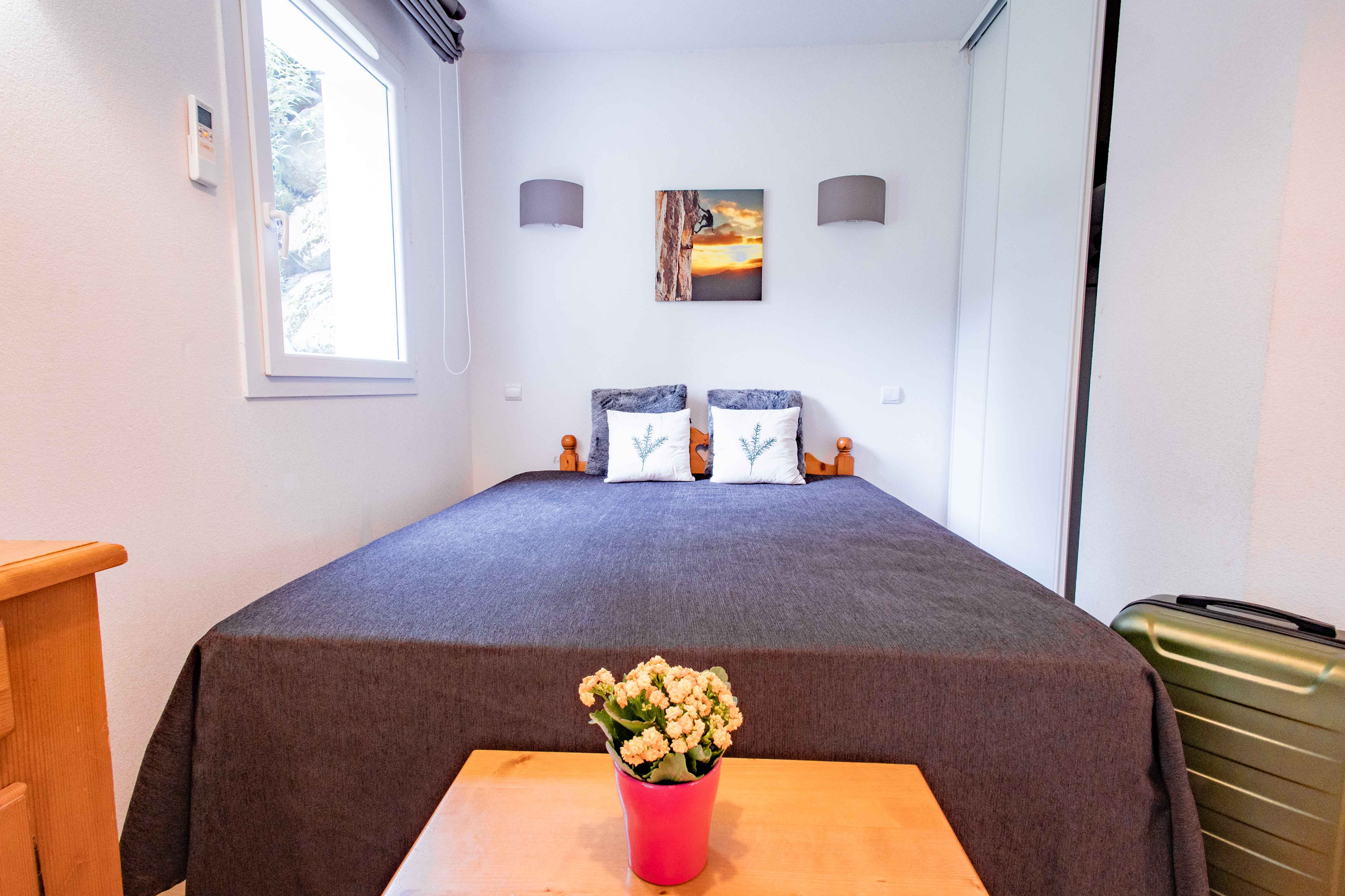 image Peaceful sleeping corner with double bed, ideal for unwinding after spa time or trail walks.