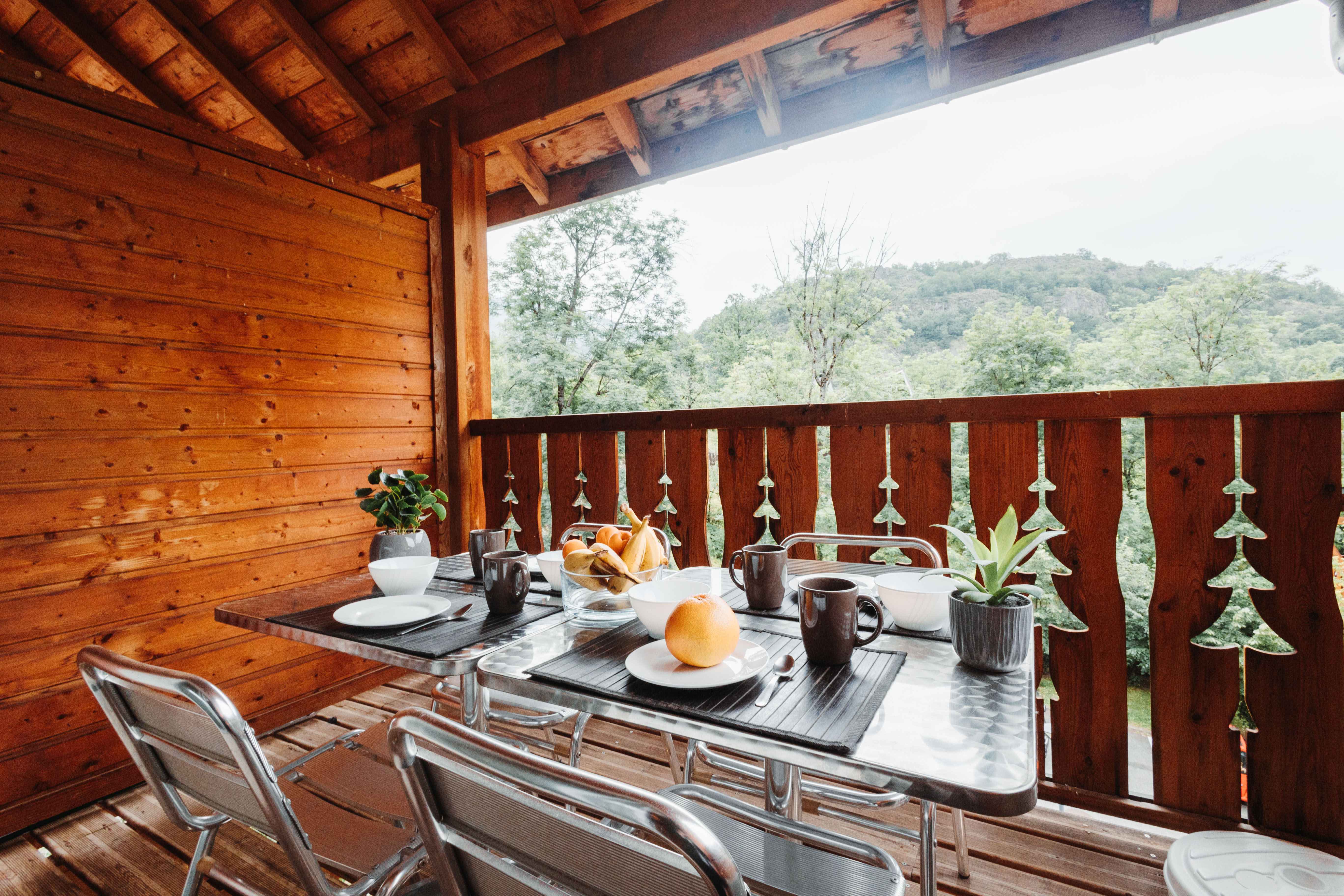 image Breathe in mountain air over a relaxed meal on your private balcony with woodland views.