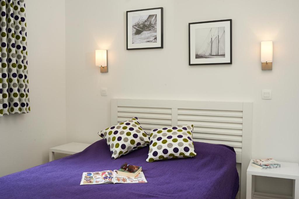 image The serene bedroom features a double bed with stylish decor and a calming color scheme, inviting relaxation.
