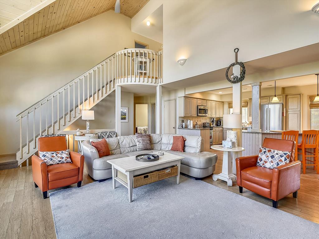 image Charming loft view overlooking the main living space with abundant natural light.