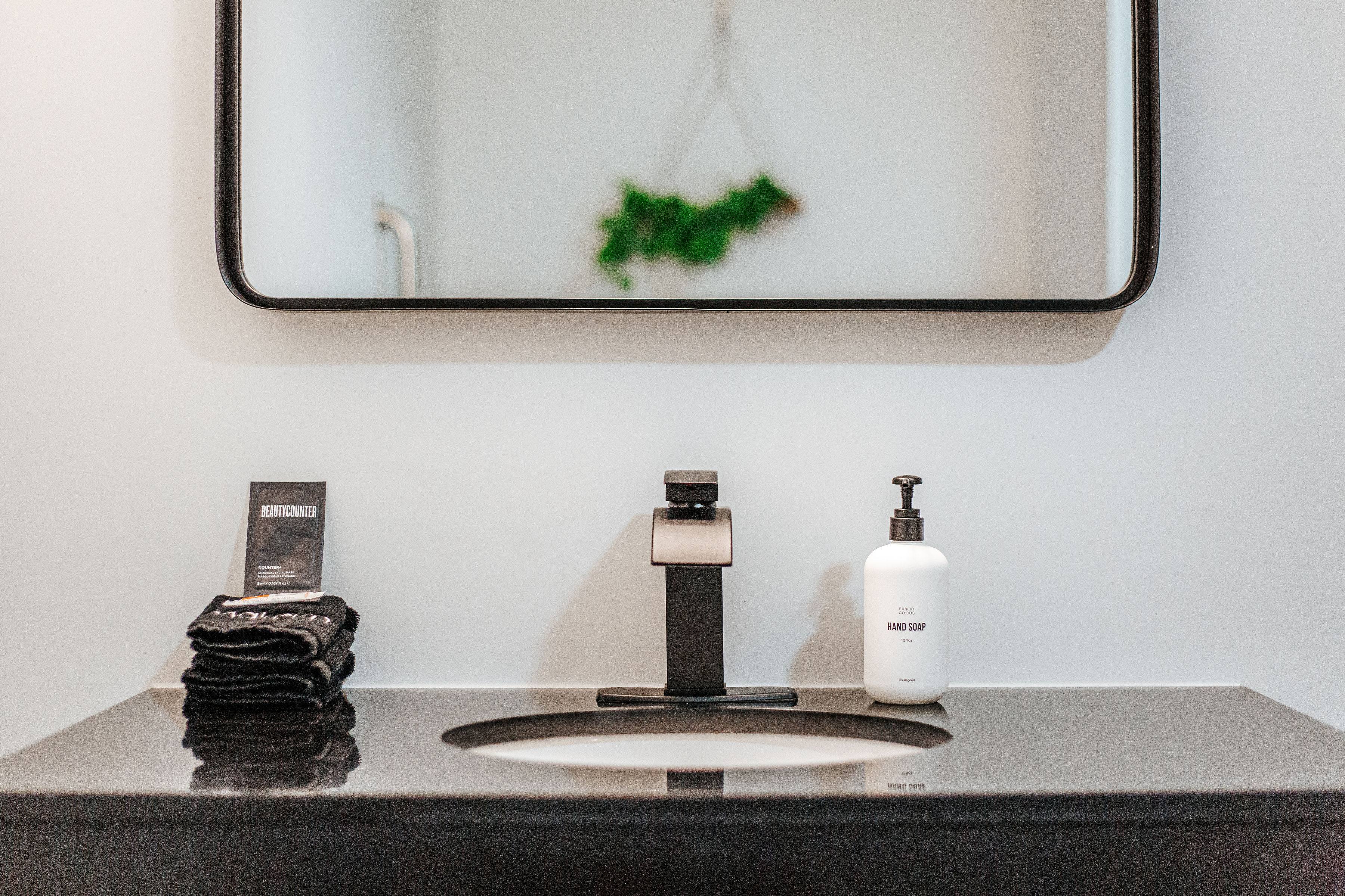 image Stylish bathroom with contemporary fixtures and amenities.