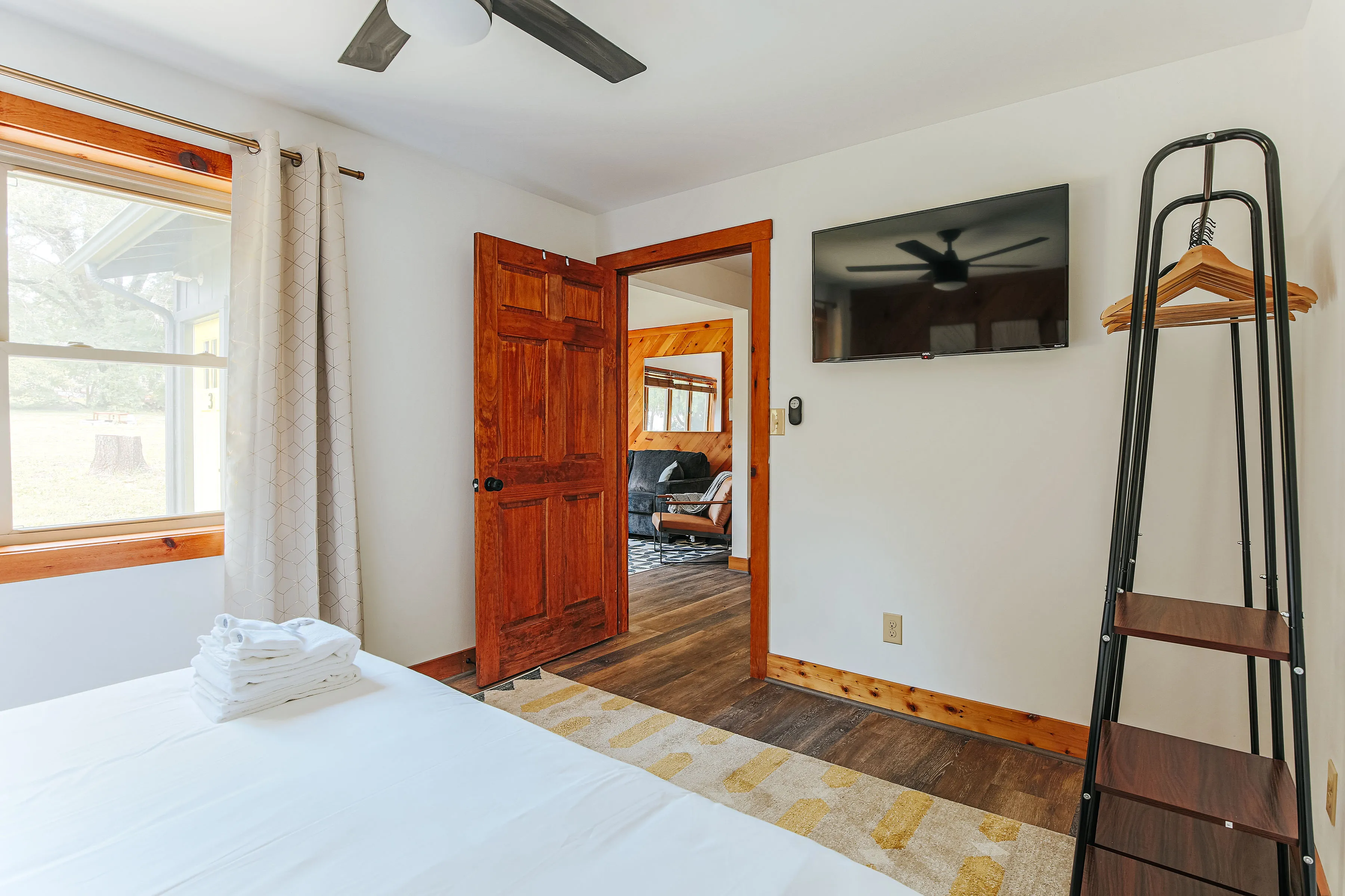 image The bedroom also features a smart TV and easy living area access.