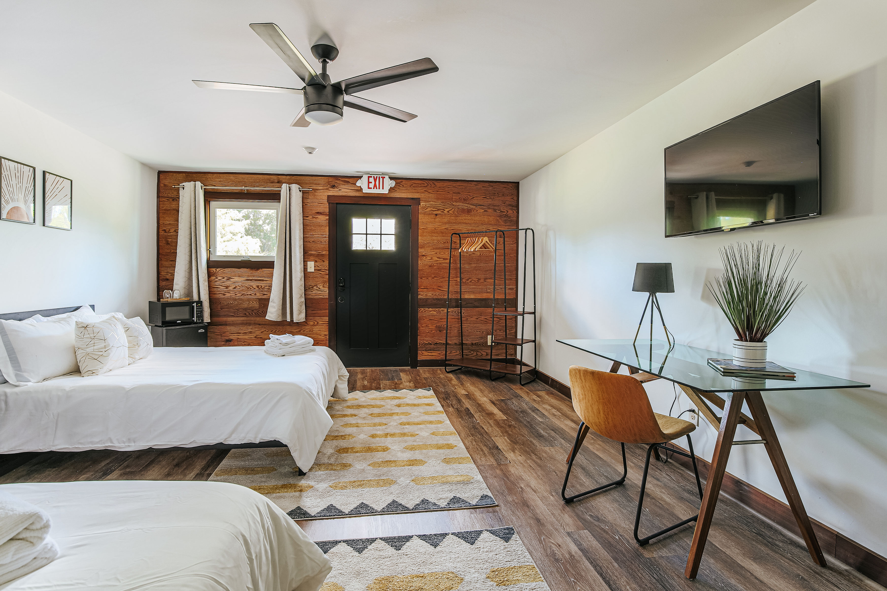 image Spacious 2-queen studio with work desk and kitchenette for comfort.