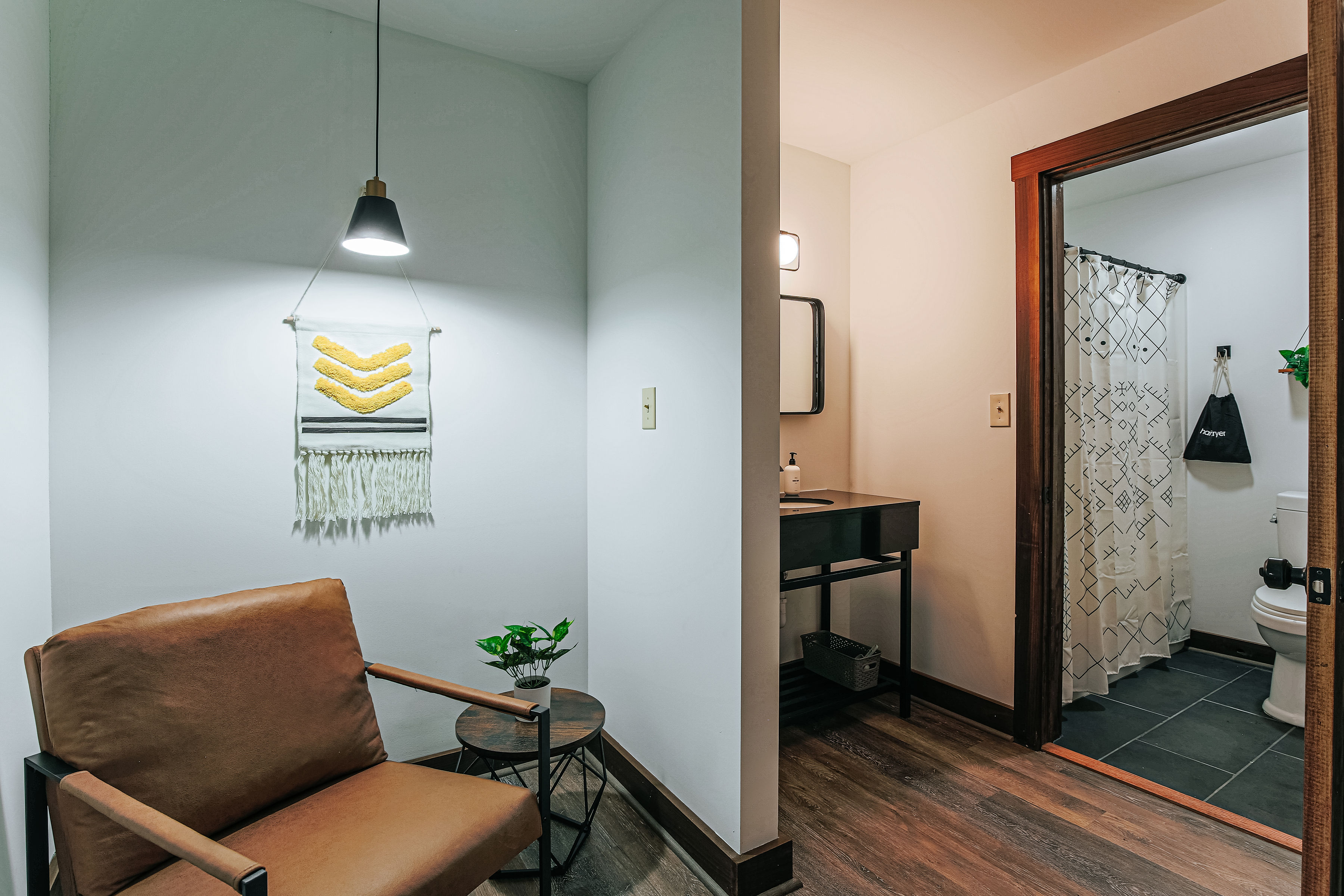 image Relax in a stylish ensuite bath, designed for convenience and tranquility.