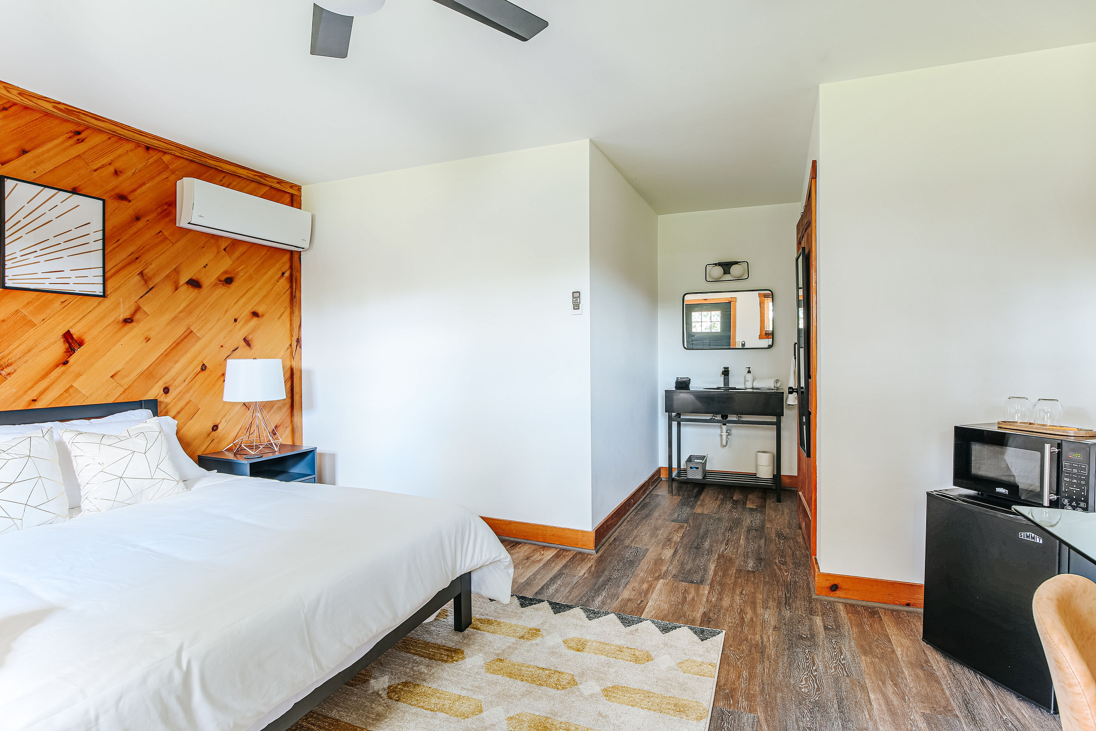 image Another angle of this suite shows the kitchenette and easy bathroom access.