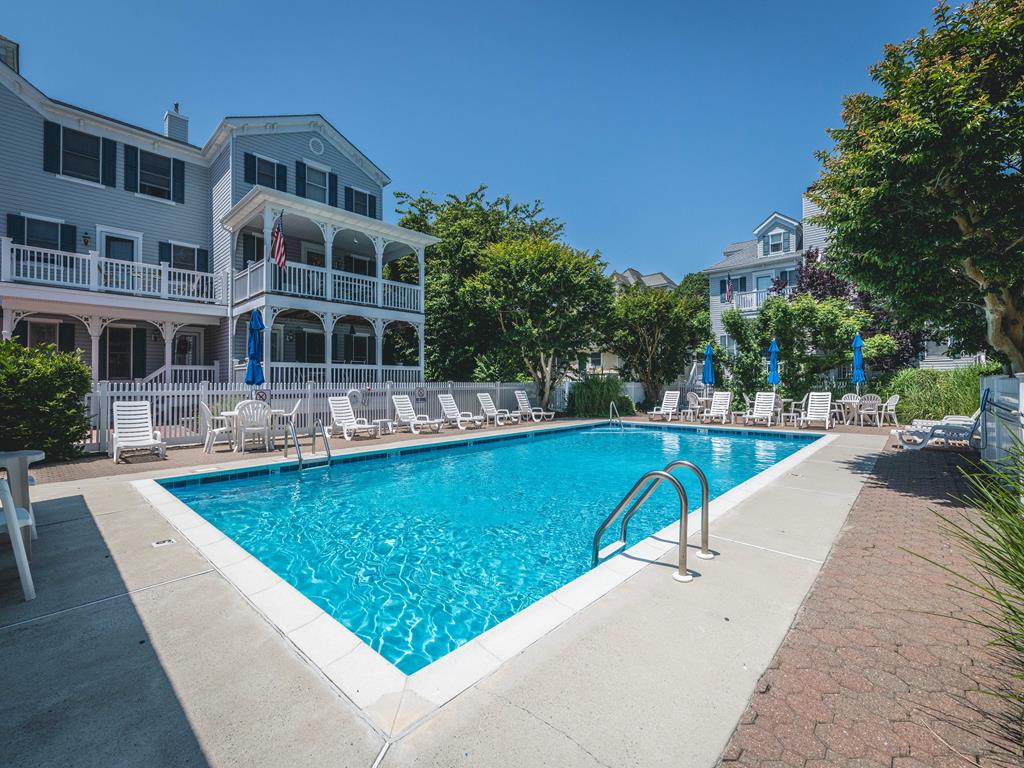 image Take a dip in the sparkling community pool, just steps from your door.