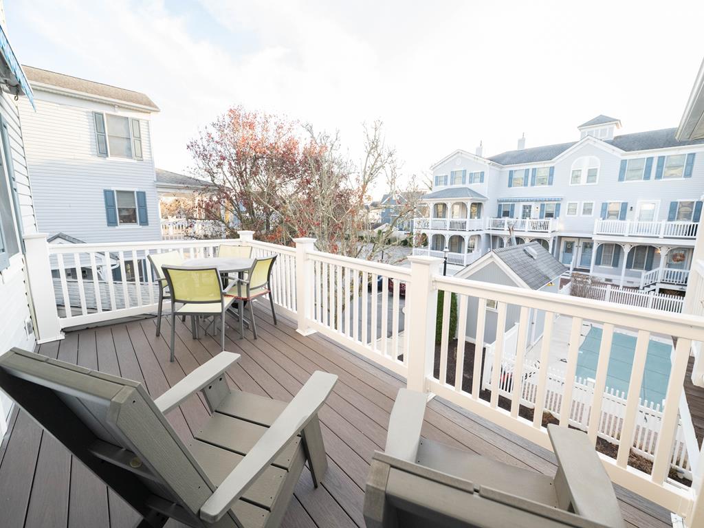 image Private balcony with pool views—ideal for morning coffee or evening wine.