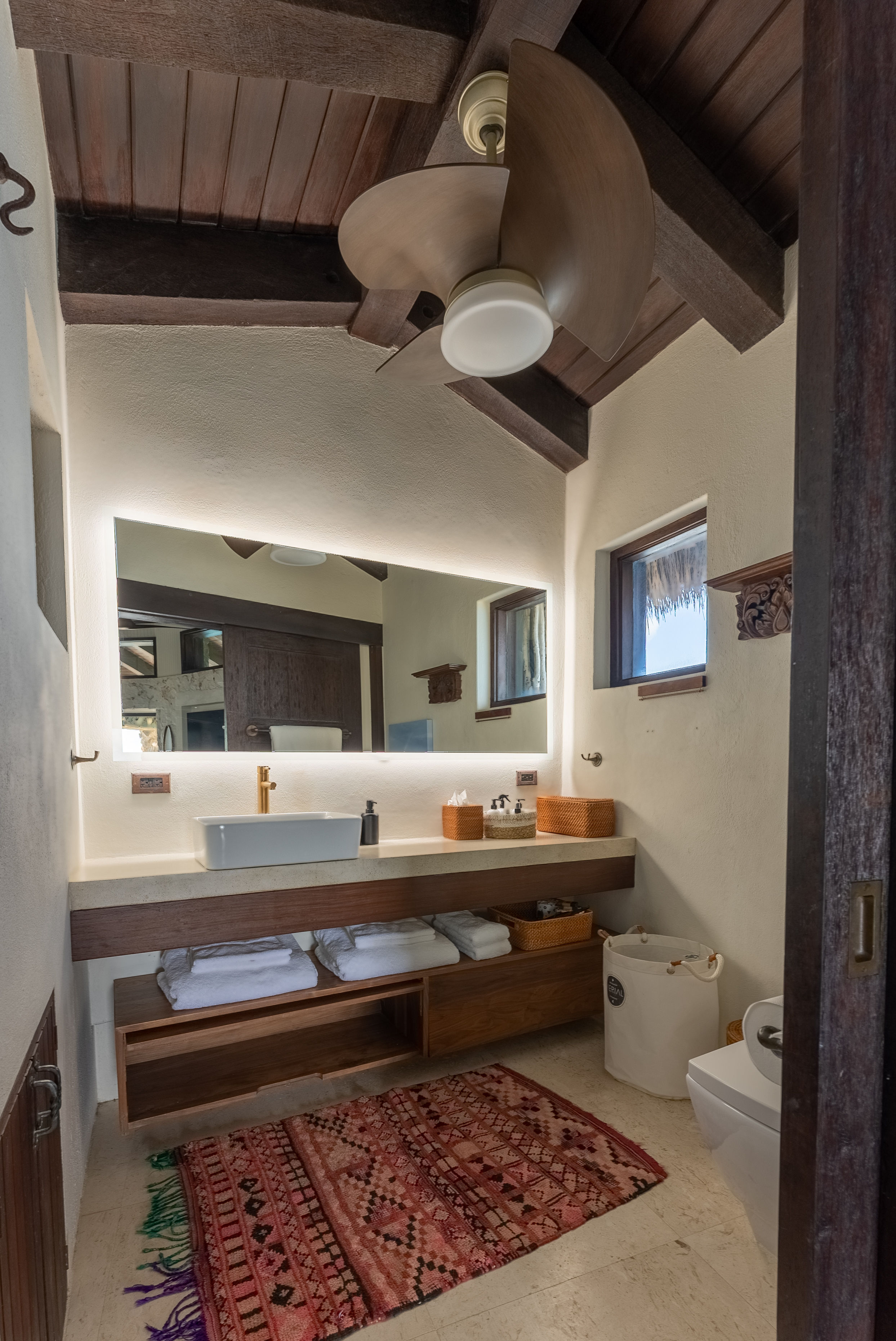 image Experience relaxation in style with a contemporary bathroom featuring elegant touches.