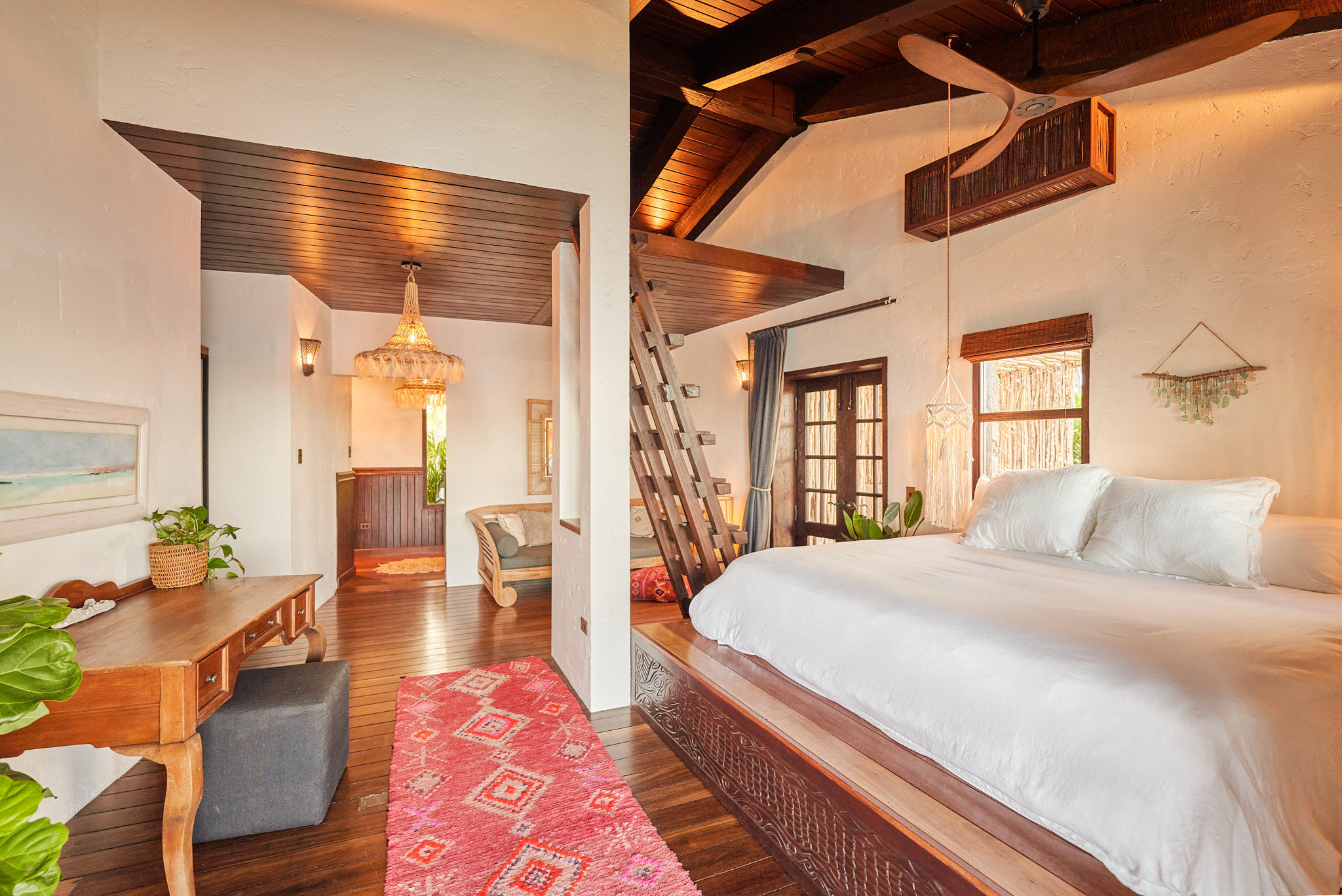 image Elegant bedroom with handcrafted furniture, soft textiles, and breezy island charm.