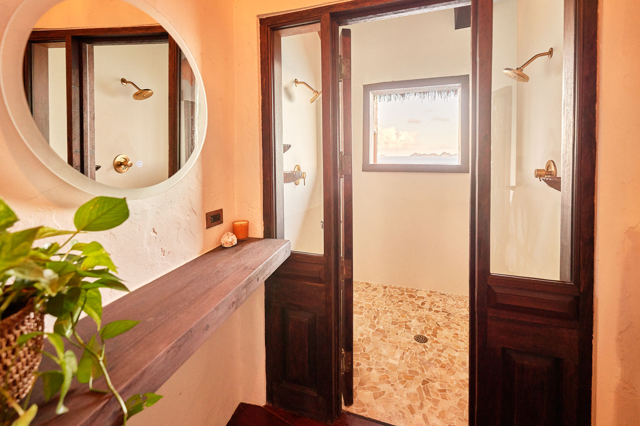 image Charming bathroom with wood accents and natural light.