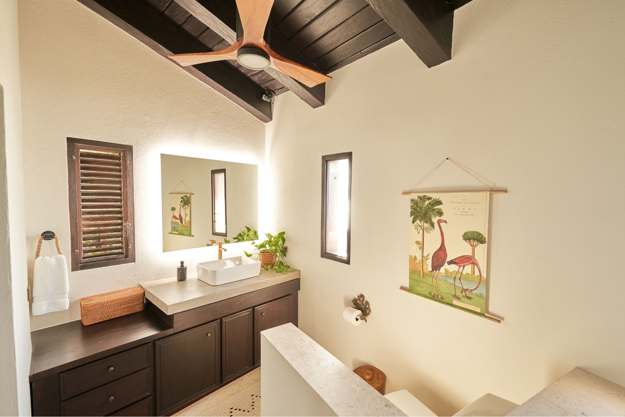 image The tranquil bathroom features stylish amenities and a calming aesthetic.