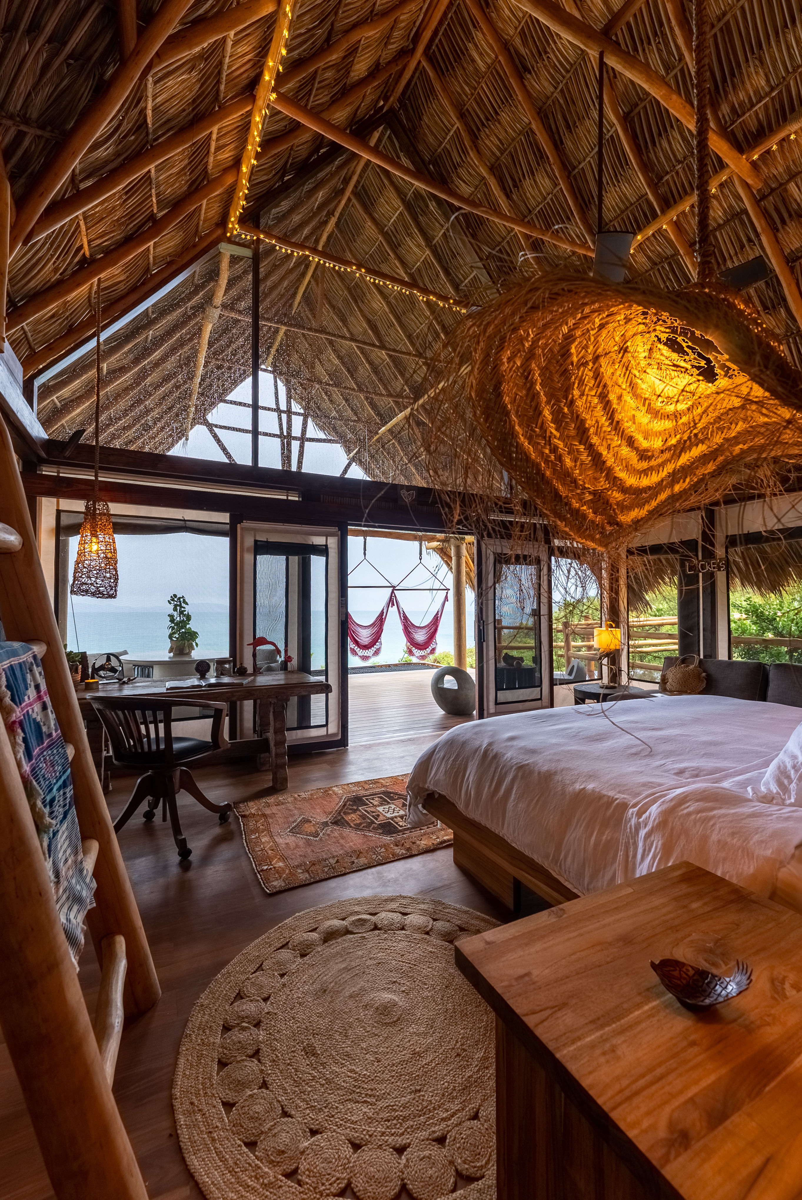 image Awaken to breathtaking ocean views and the gentle sway of hammocks in your serene sanctuary.